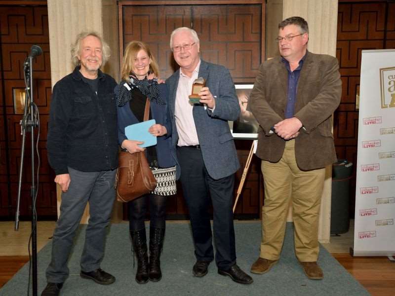 Professor Michael Fulford pictured with his award and with fellow lecturer, Amanda Clarke and archaeologist/television presenter, Julian Richards and Oliver Gilkes from Andante Travels - award sponsor