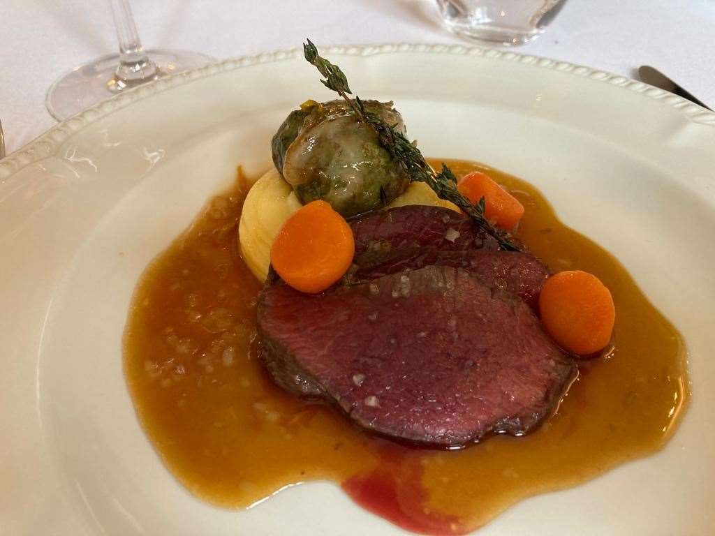 Saddle and farci of venison with carrots, a smooth mashed potato, cardamom and sauce bigarade