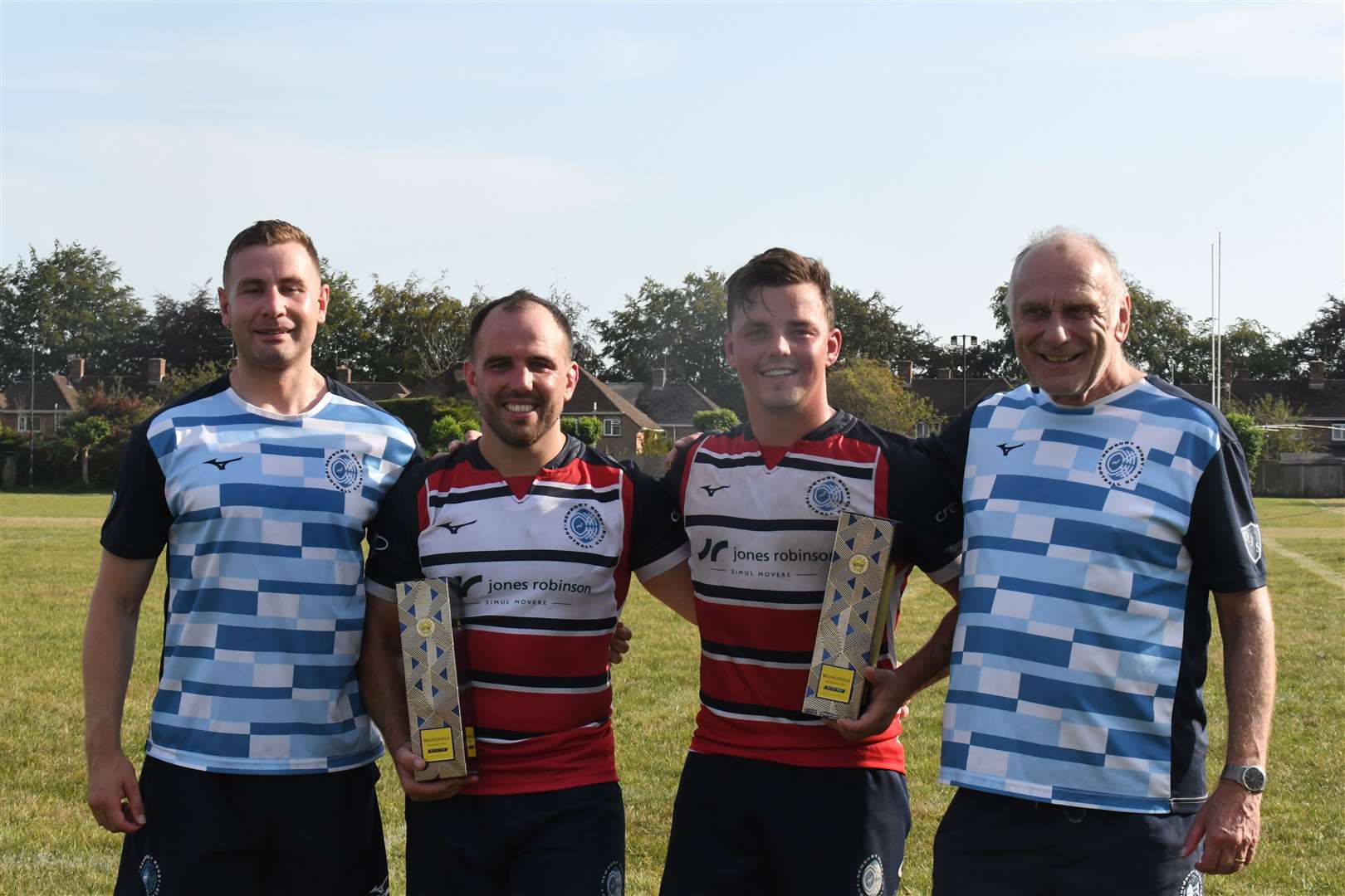 Dan Thorne and Dylan Stewart celebrate their milestone appearances with head coach James McAvoy and team manager Mick Futcher