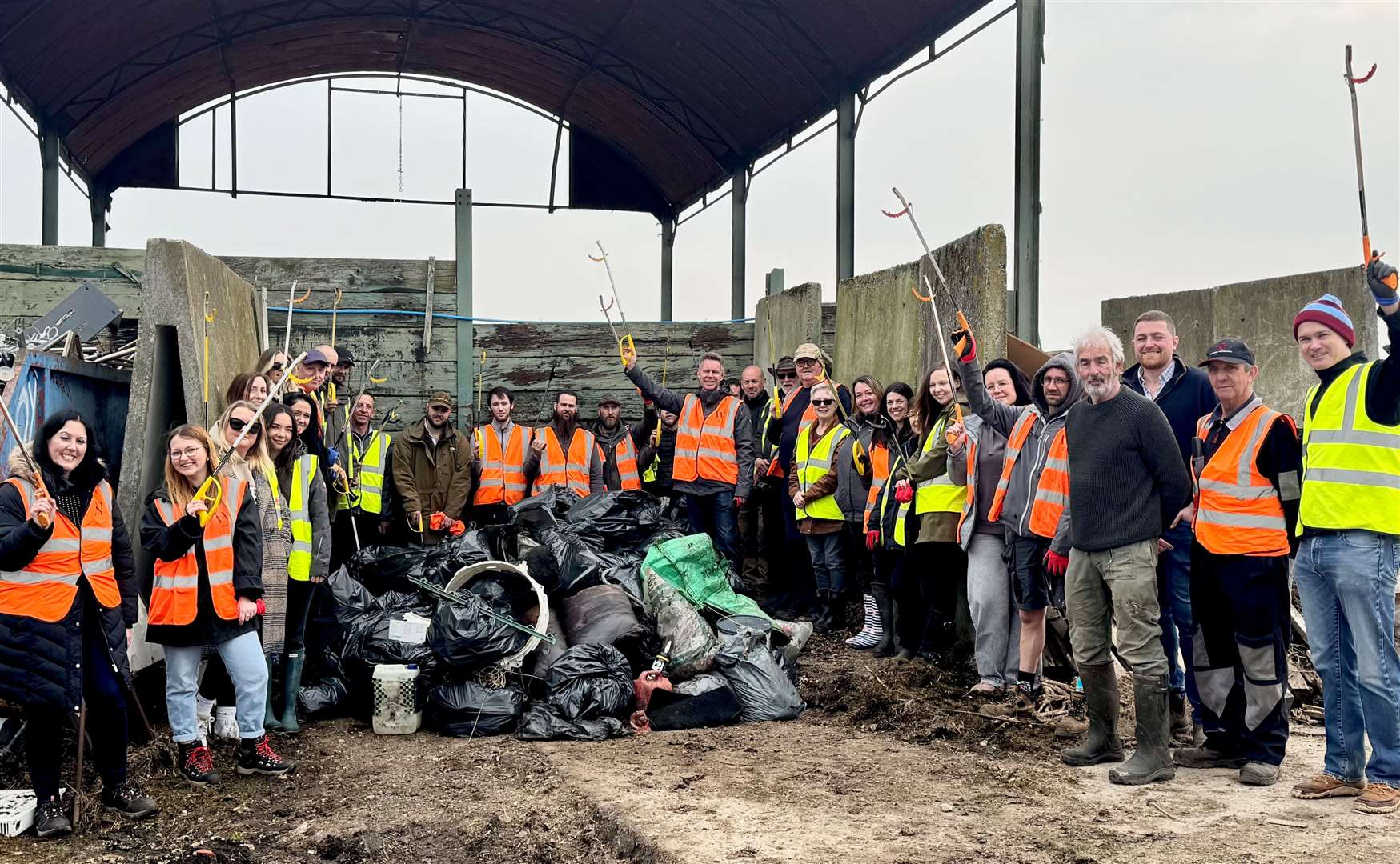 Team at Wasing Estate pose with what they collected during their annual Litter Pick. Credit: @Wasing1759