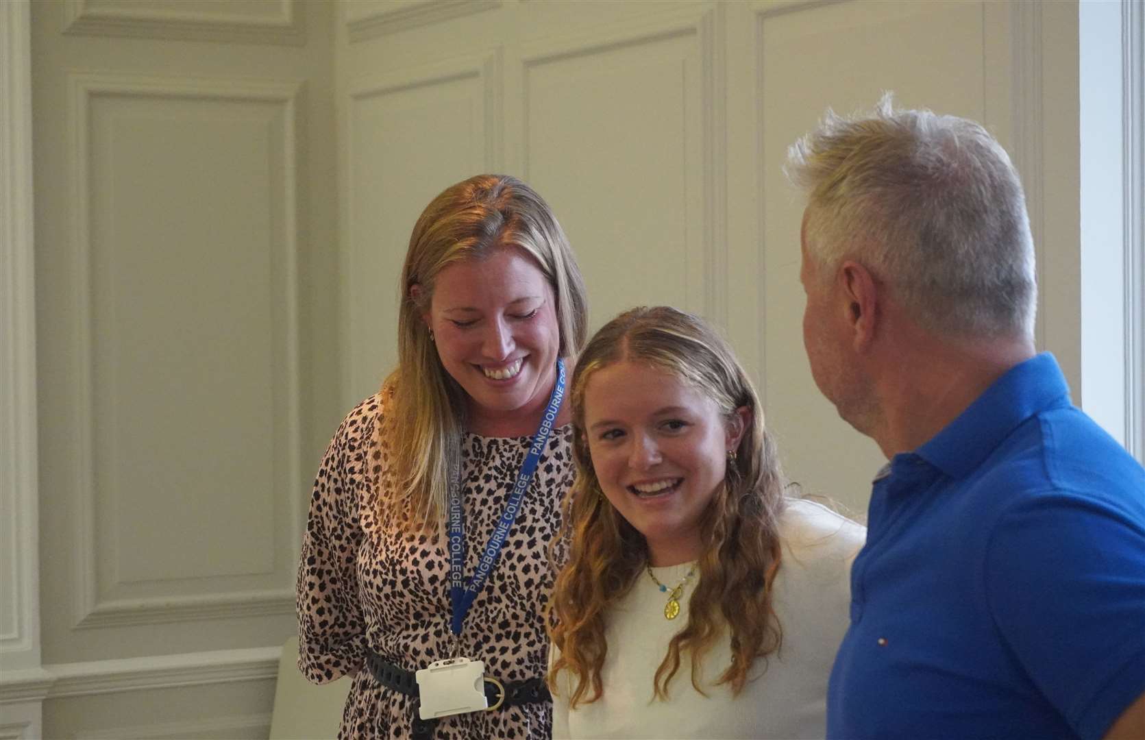 Amy Perrott with her father and teacher Stephanie Poynter