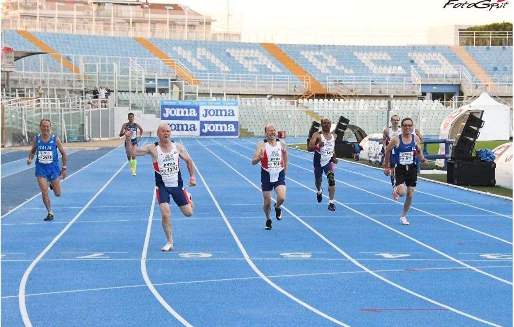 Simon Barrett crosses the line for gold