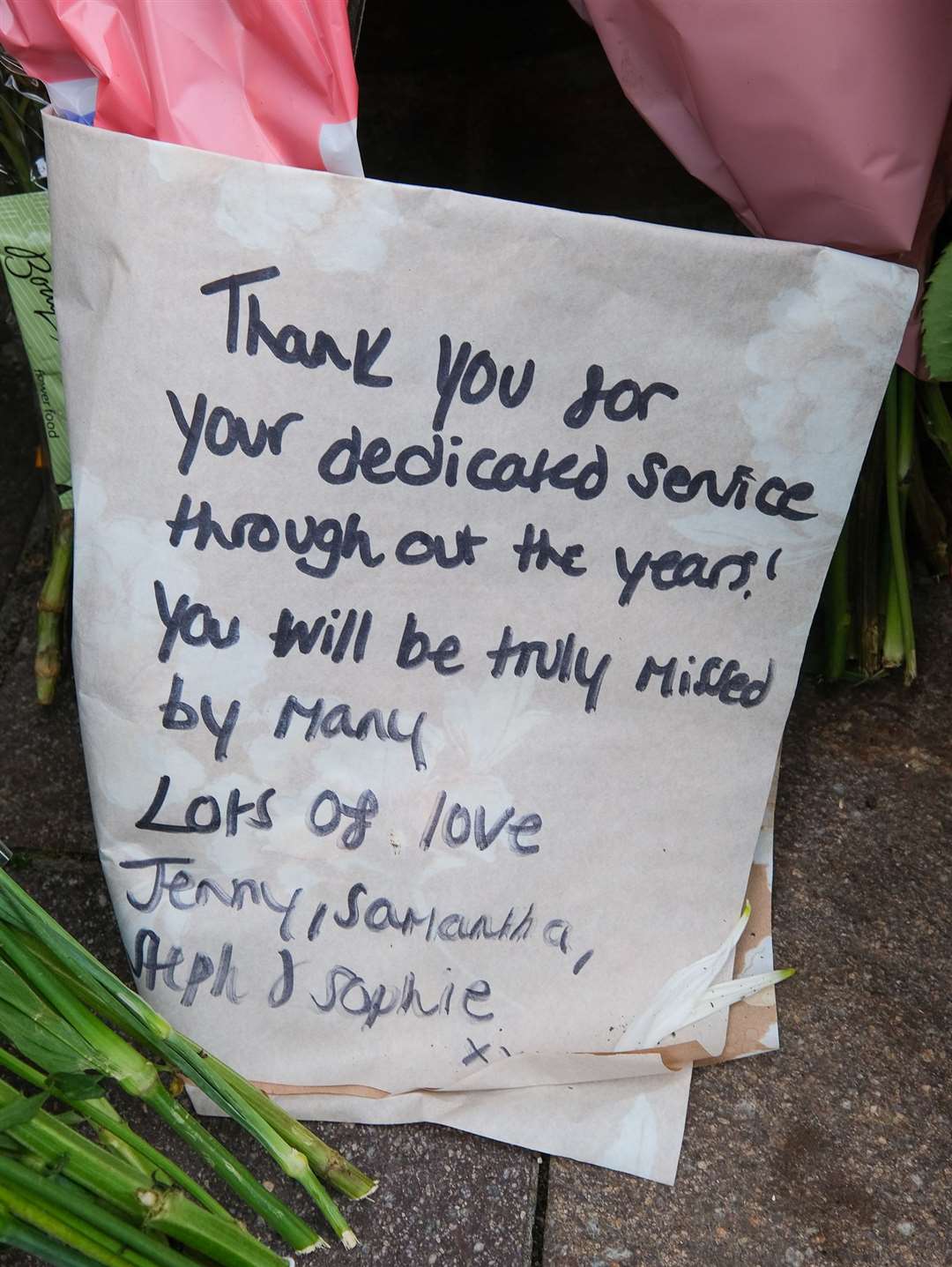 Some of the tributes left for the Queen outside Newbury Town Hall. Picture by Phil Cannings