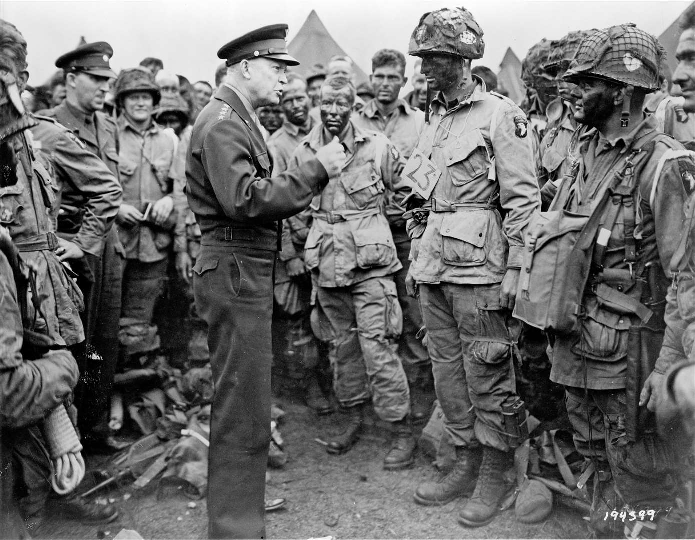 Image 1- General Eisenhower addressing the first invasion force of the 101st Airborne Division at RAF Greenham Common on June 5, 1944. Public DomainOnline it says: 'This file is a work of a U.S. Army soldier or employee, taken or made as part of that person's official duties. As a work of the U.S. federal government, it is in the public domain in the United States.'