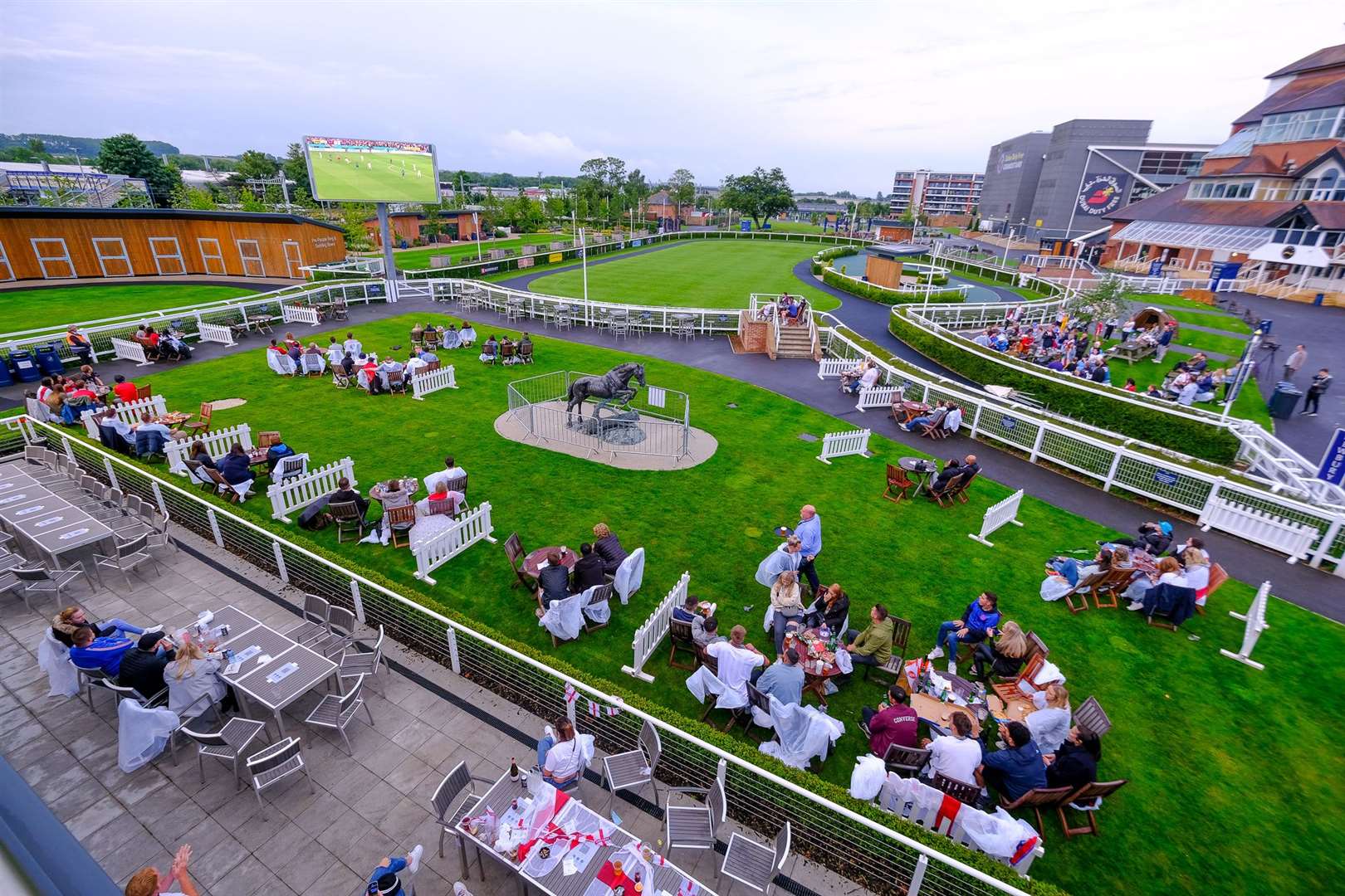 England fans watch the game at Newbury Racecourse.Ref: 28-0921.. (49112103)