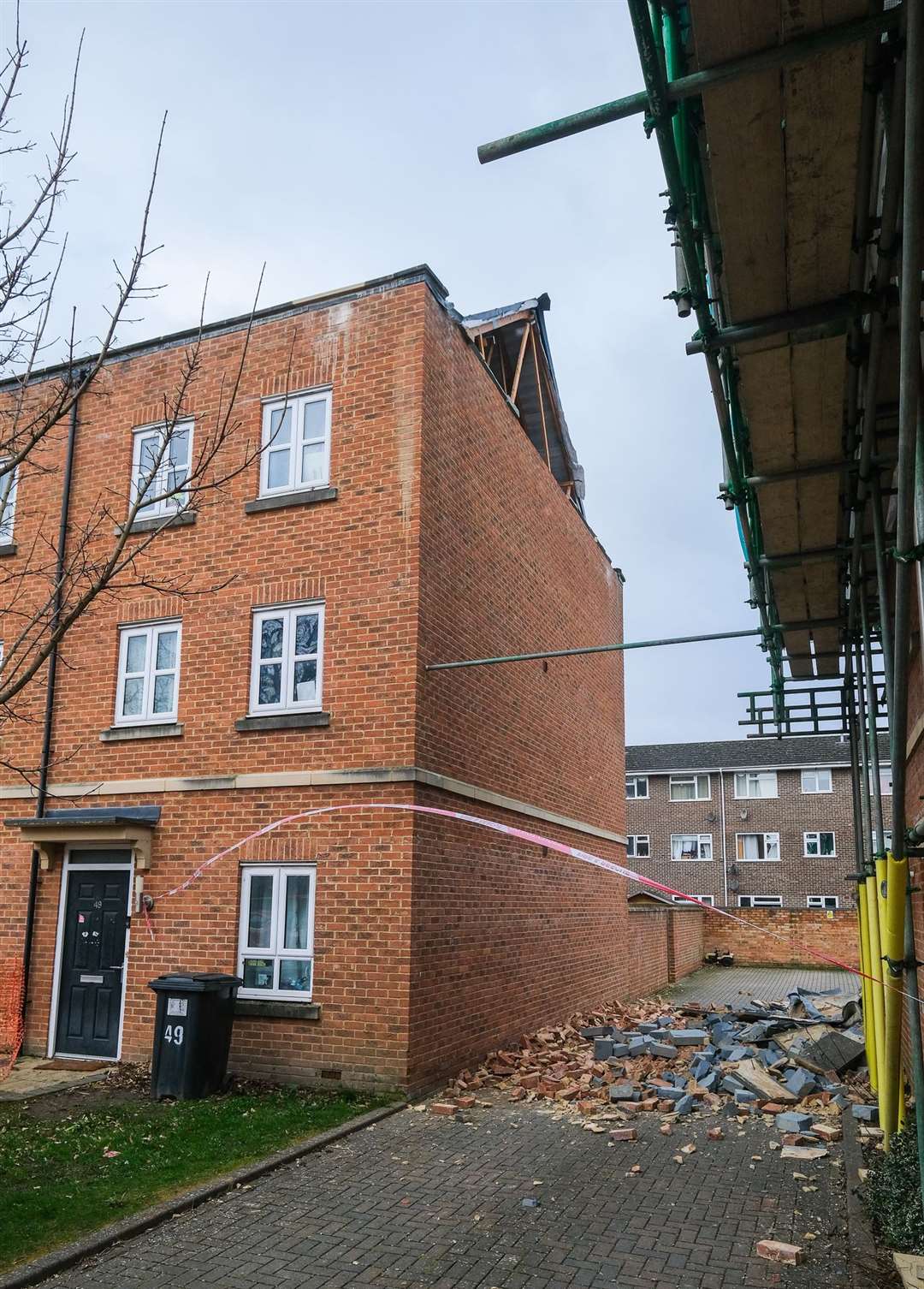 Bricks and rubble next to the house