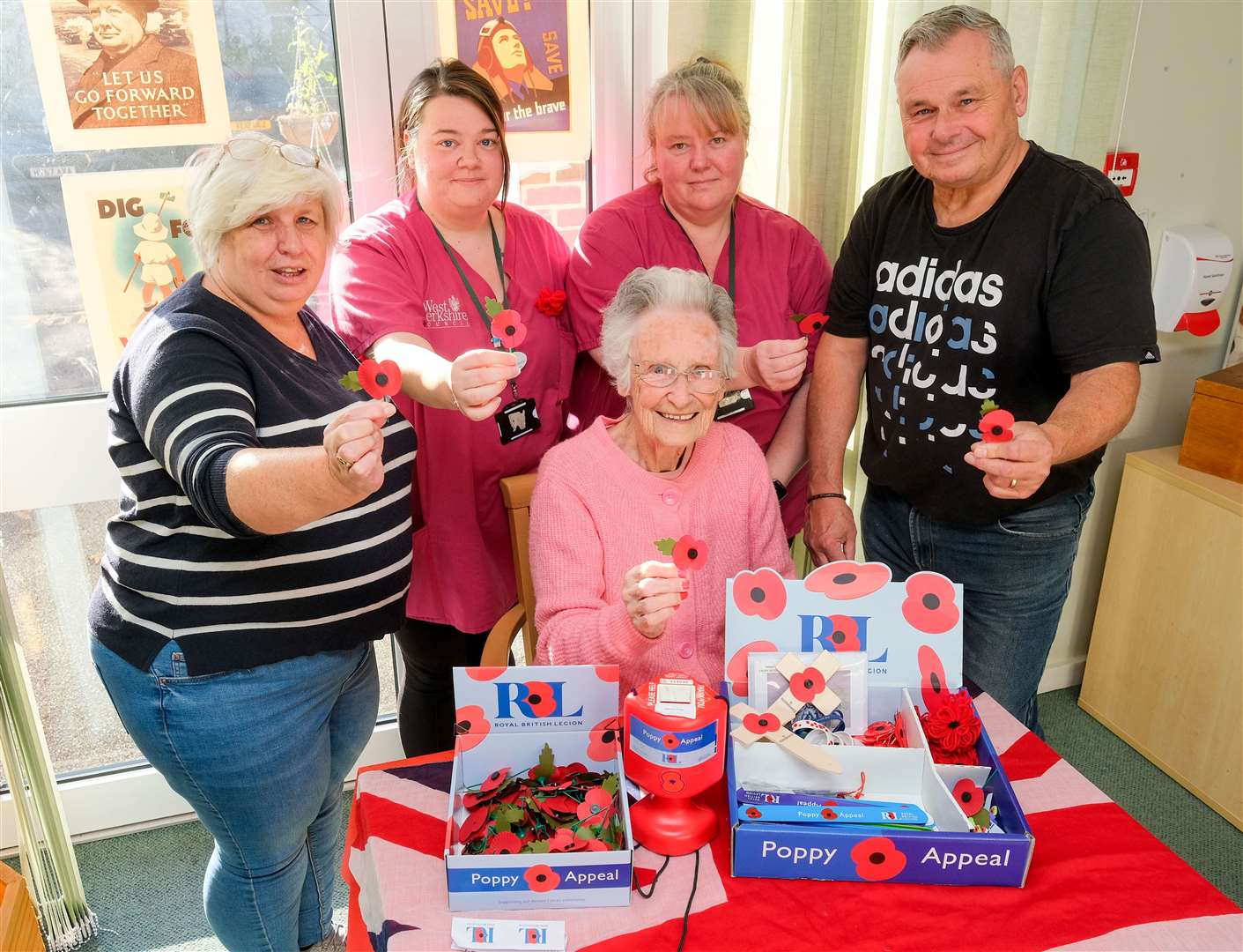Dot Huntley selling poppies at Willow Edge