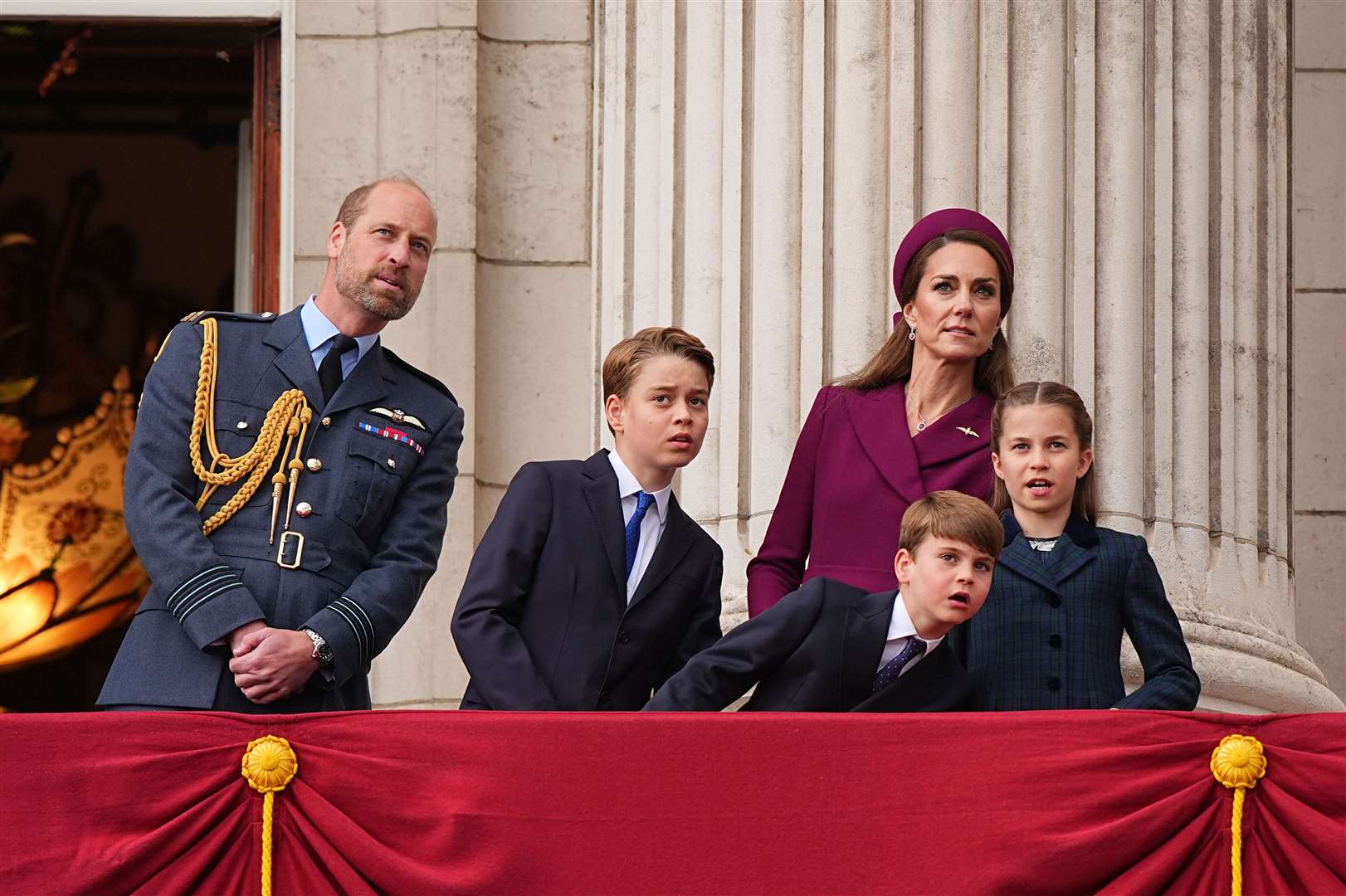 The Waleses watched the flypast soar above Buckingham Palace (Aaron Chown/PA)