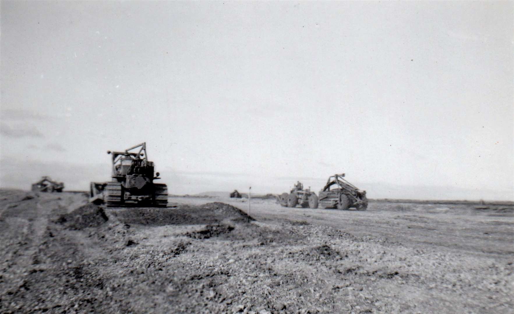 Levelling off the land to lay a hardstanding area to park the planes, June 1952