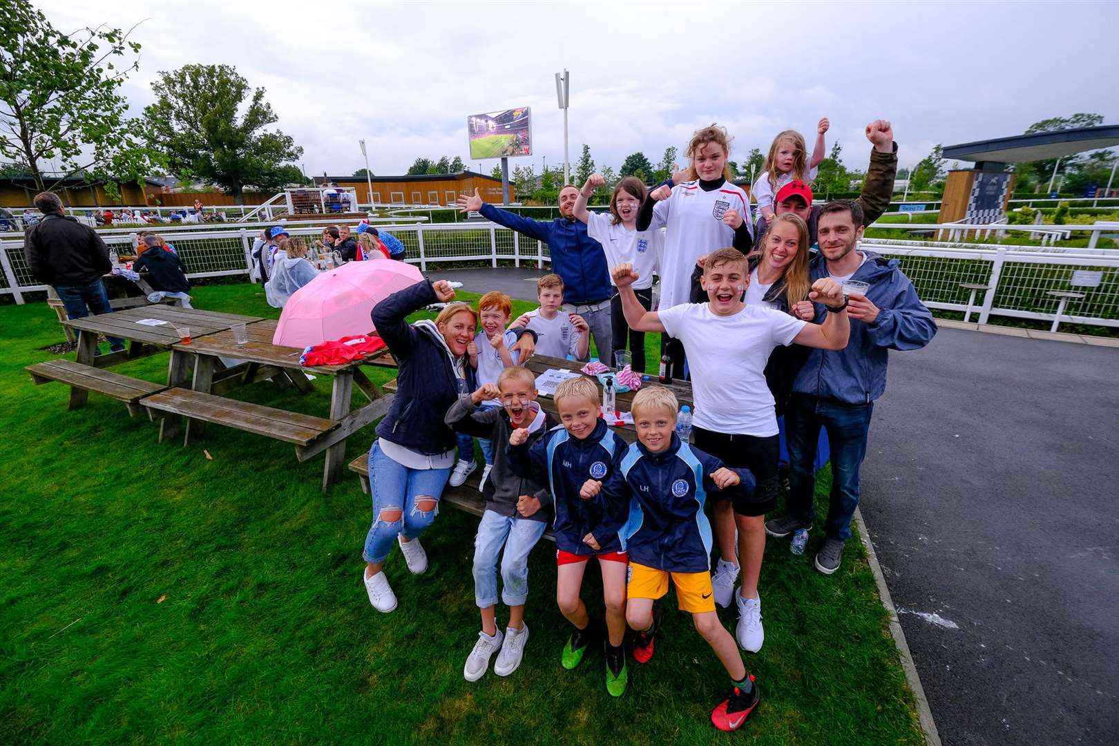 England fans watch the game at Newbury Racecourse.Ref: 28-0921.. (49112179)