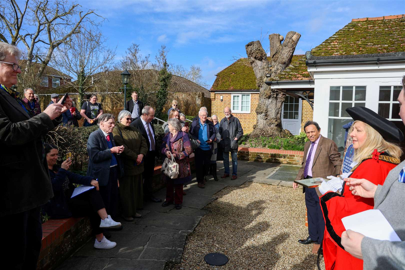 Councillors, historians and members of the public gather to celebrate the unveiling