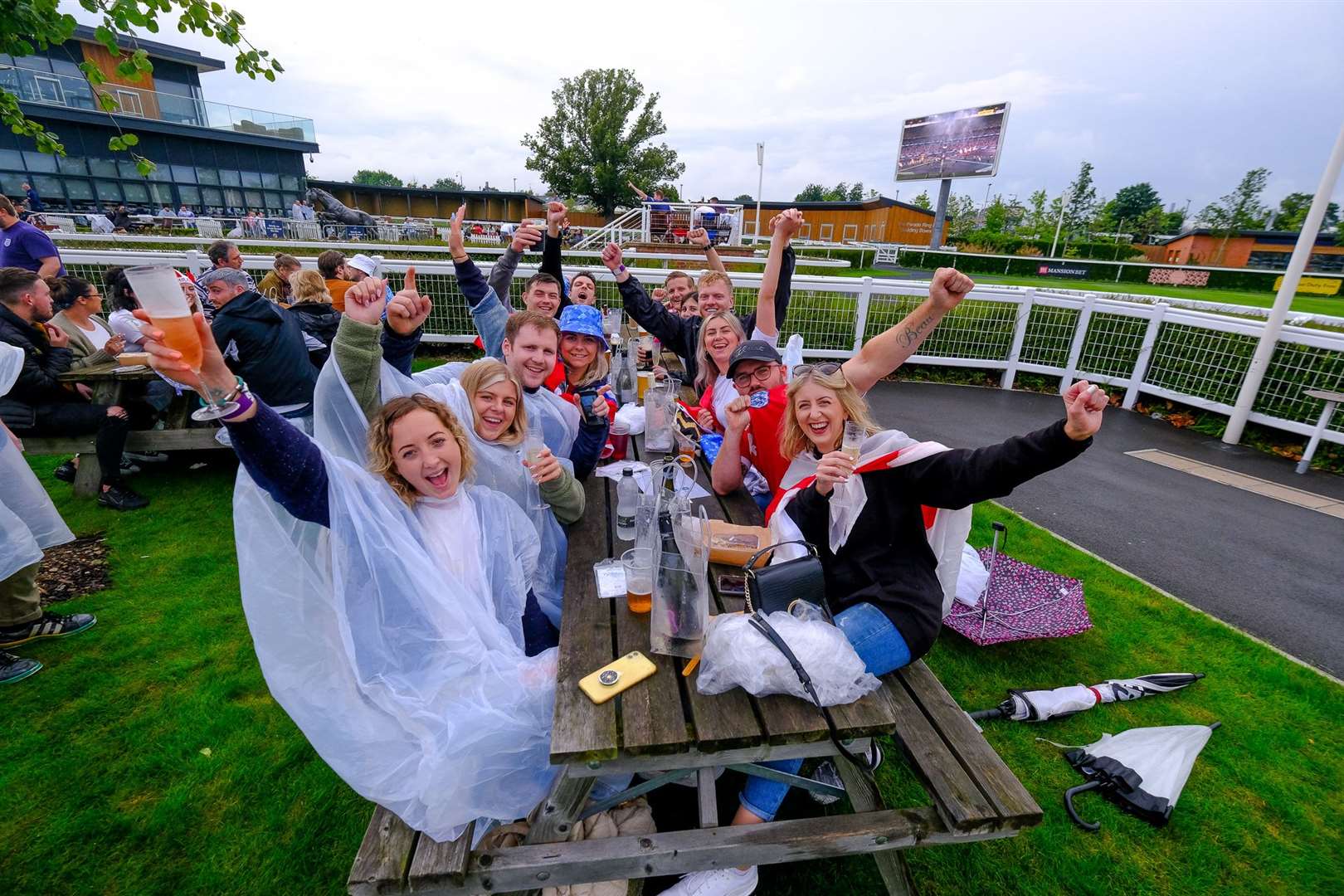 England fans watch the game at Newbury Racecourse.Ref: 28-0921.. (49112081)