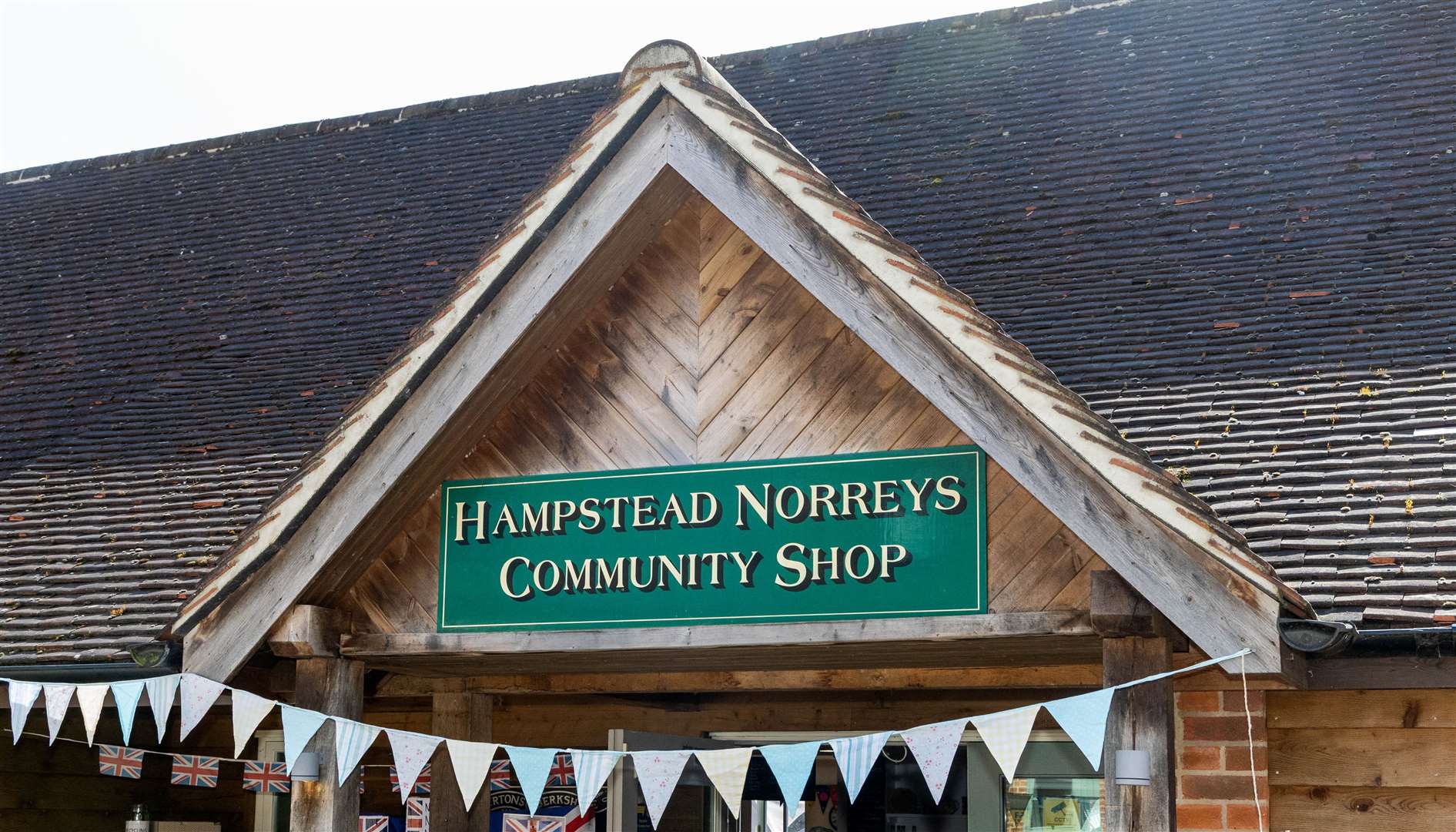 Staff and volunteers celebrate 14th birthday of Hampstead Norreys Community Shop