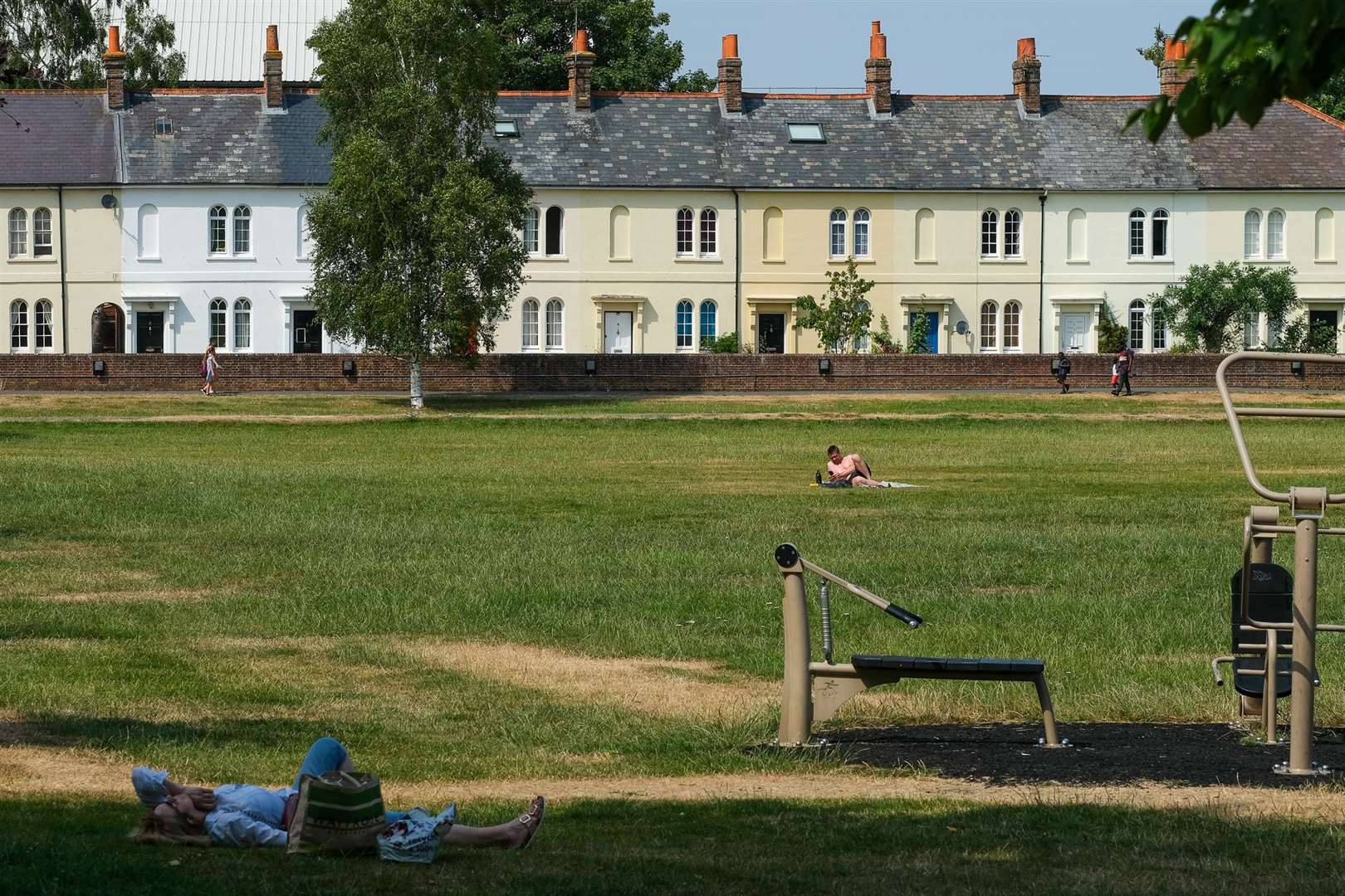 A few sunbathers in Victoria Park Newbury