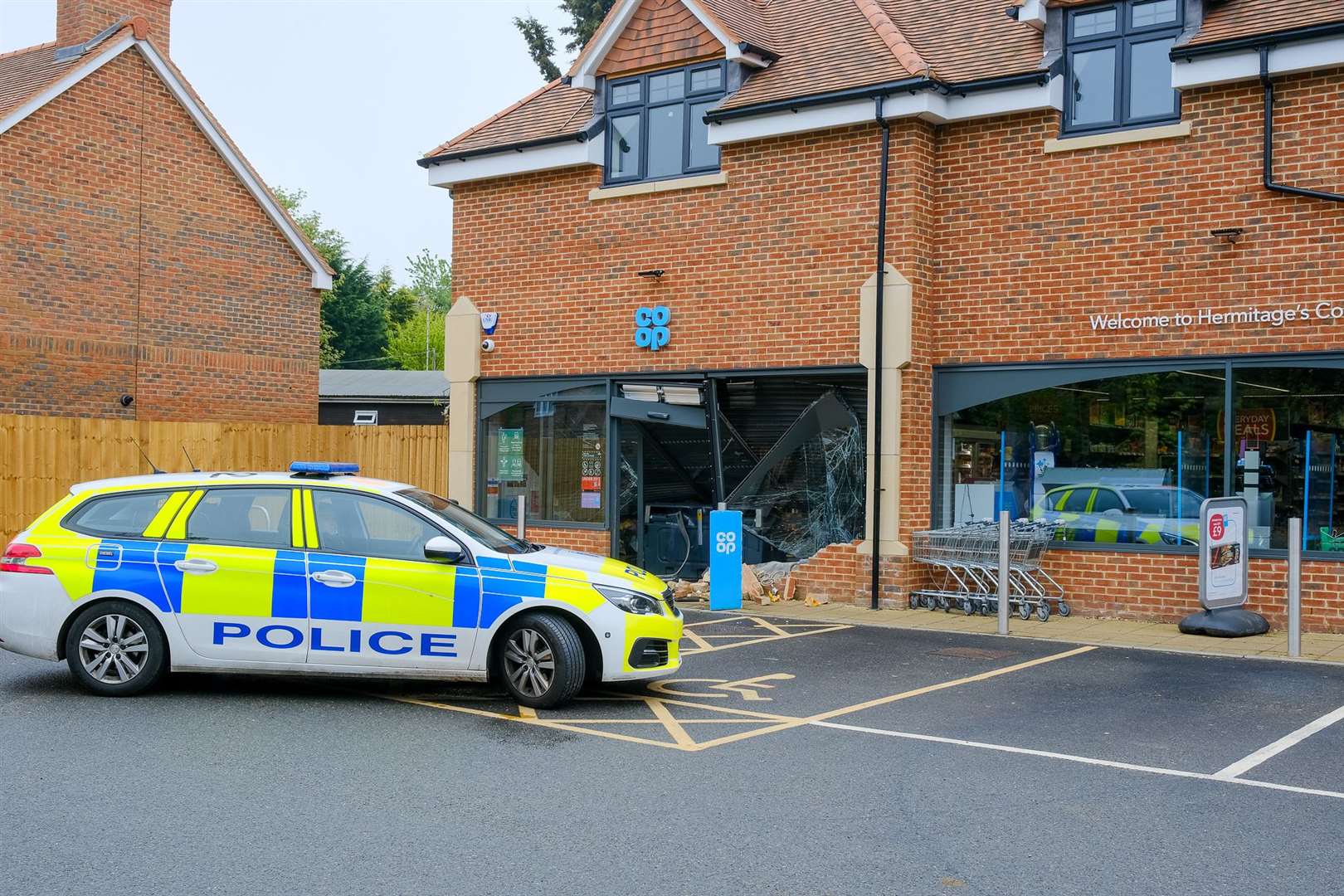 Police attend the scene of the break in