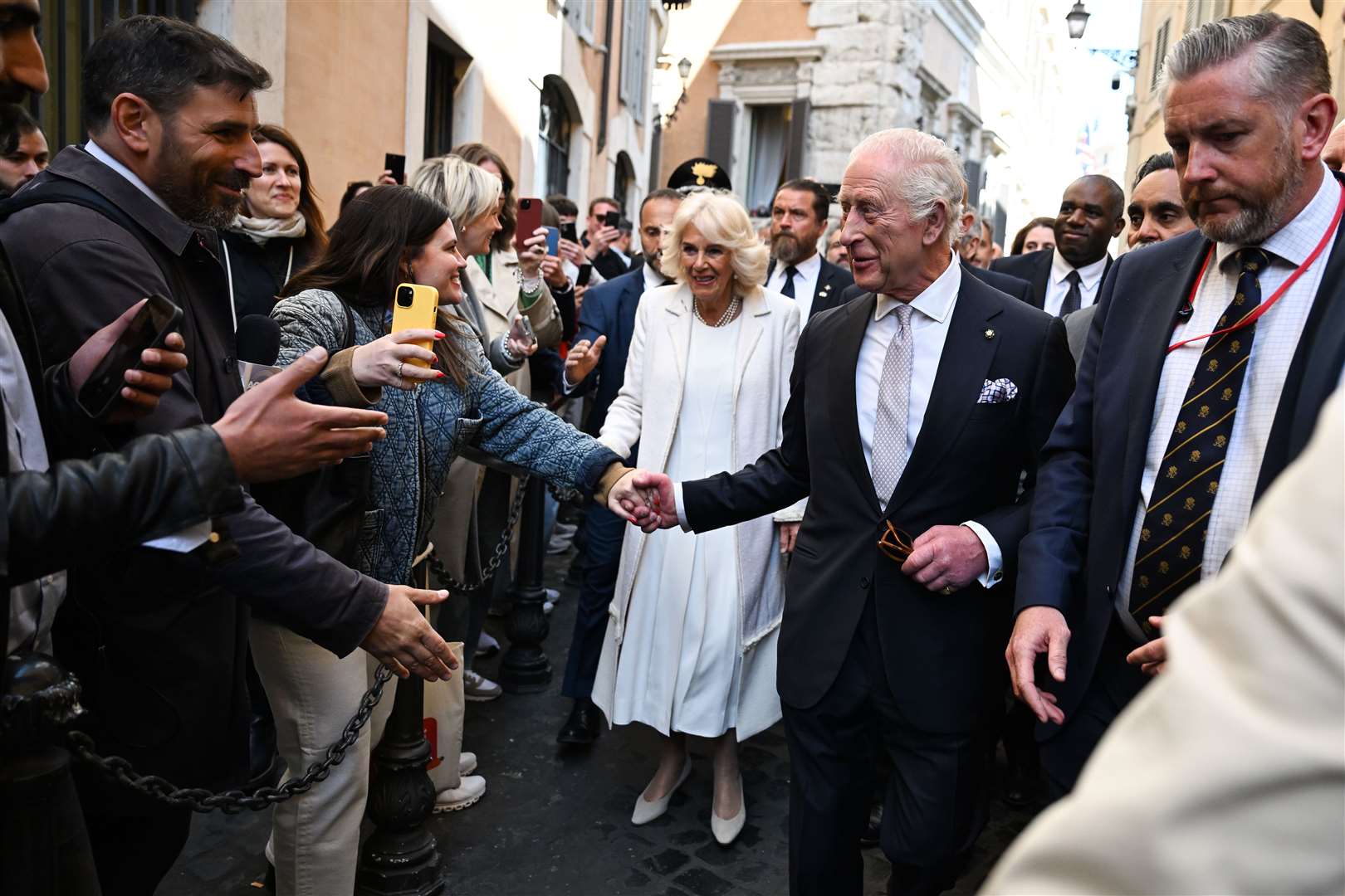 Charles and Camilla meet members of the public after leaving the Italian parliament (Victoria Jones/PA)