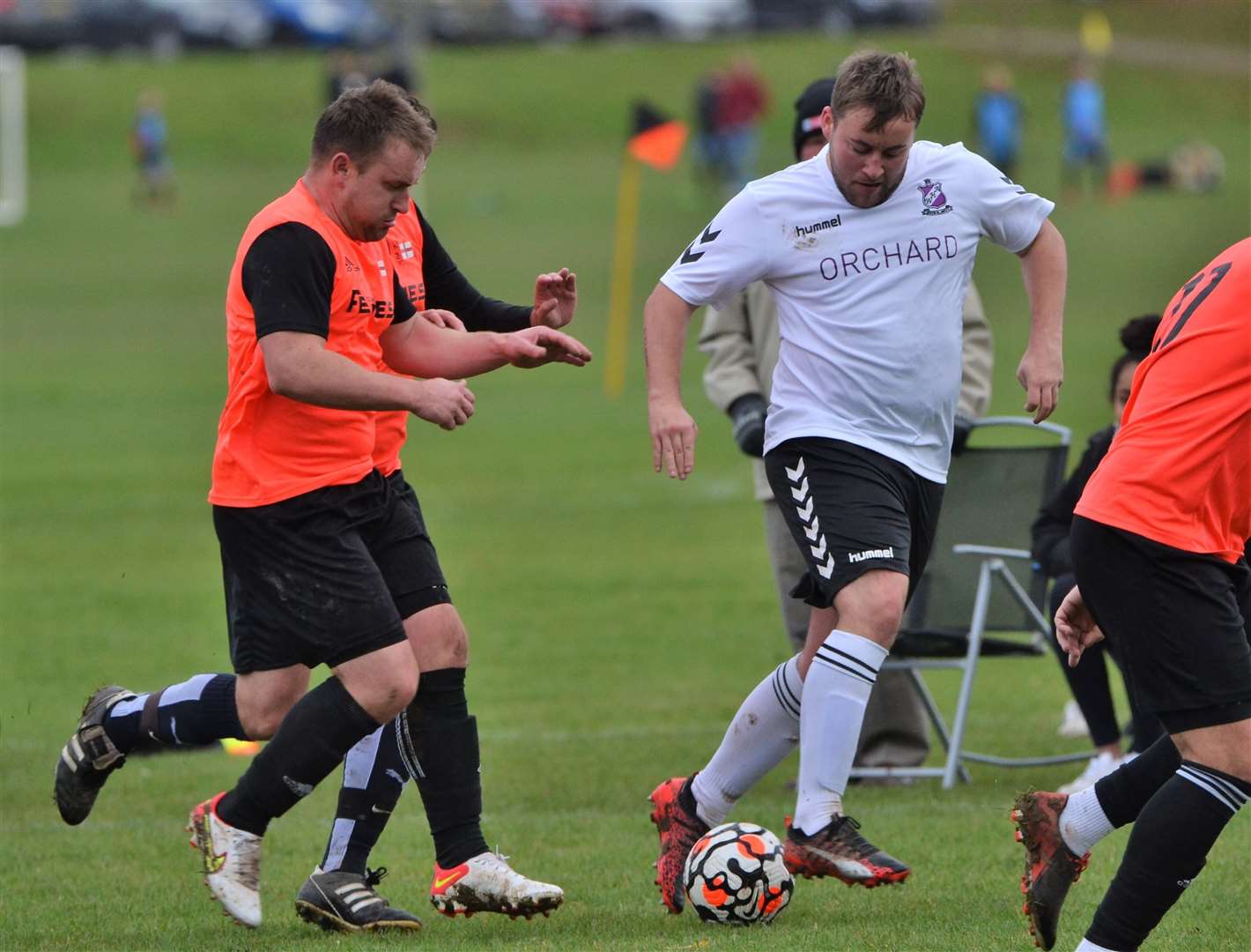 Harry Monger on the ball for Woolton Hill