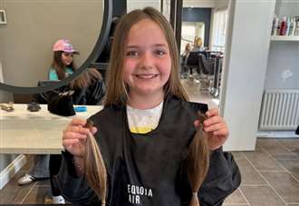 Girl cuts her for cancer charity