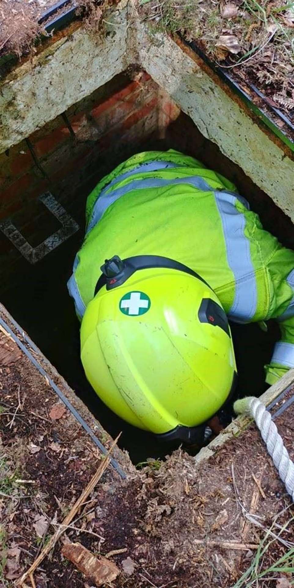 A rescue worker retrieves Zero.