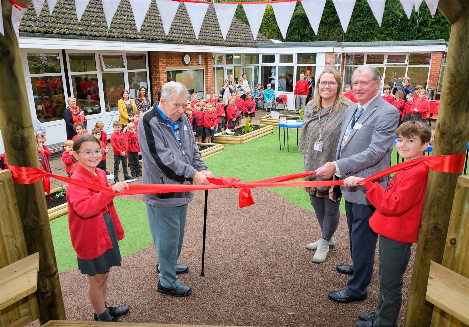 Parish councillor, Tony Renous, and West Berkshire chairman, Rick Jones, attending the opening of the new outdoor class room at Woolhampton School