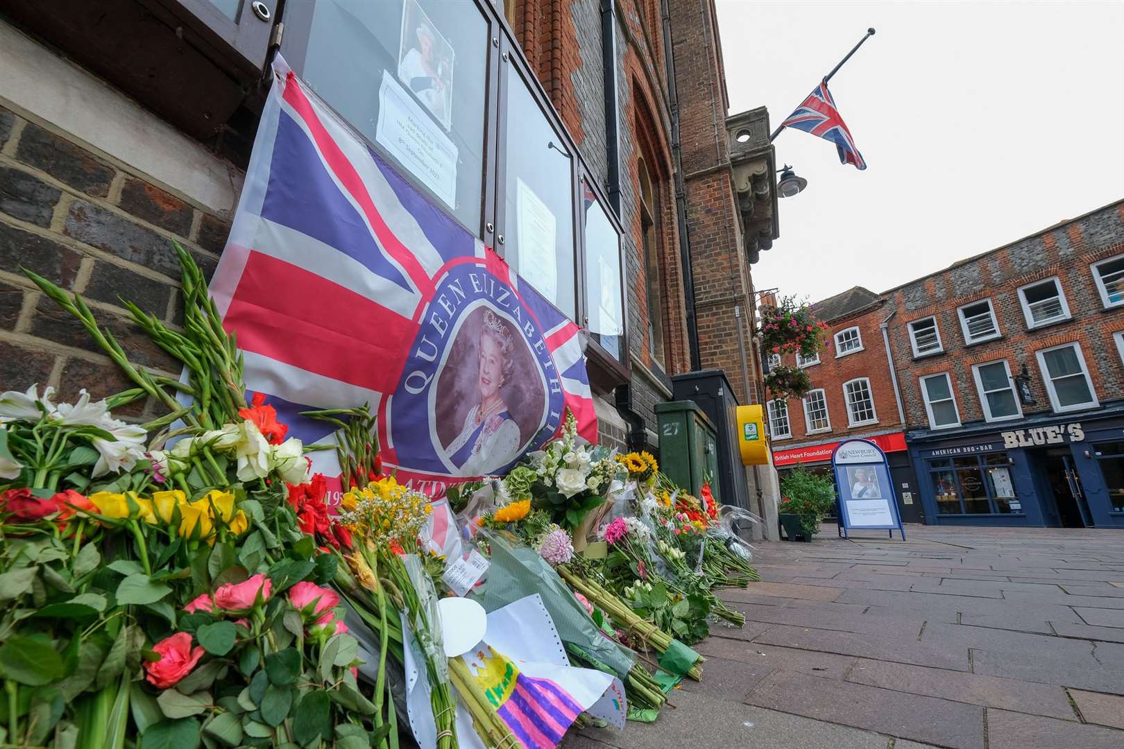 Flowers left in memory of the Queen outside Newbury Town Hall. Picture by Phil Cannings