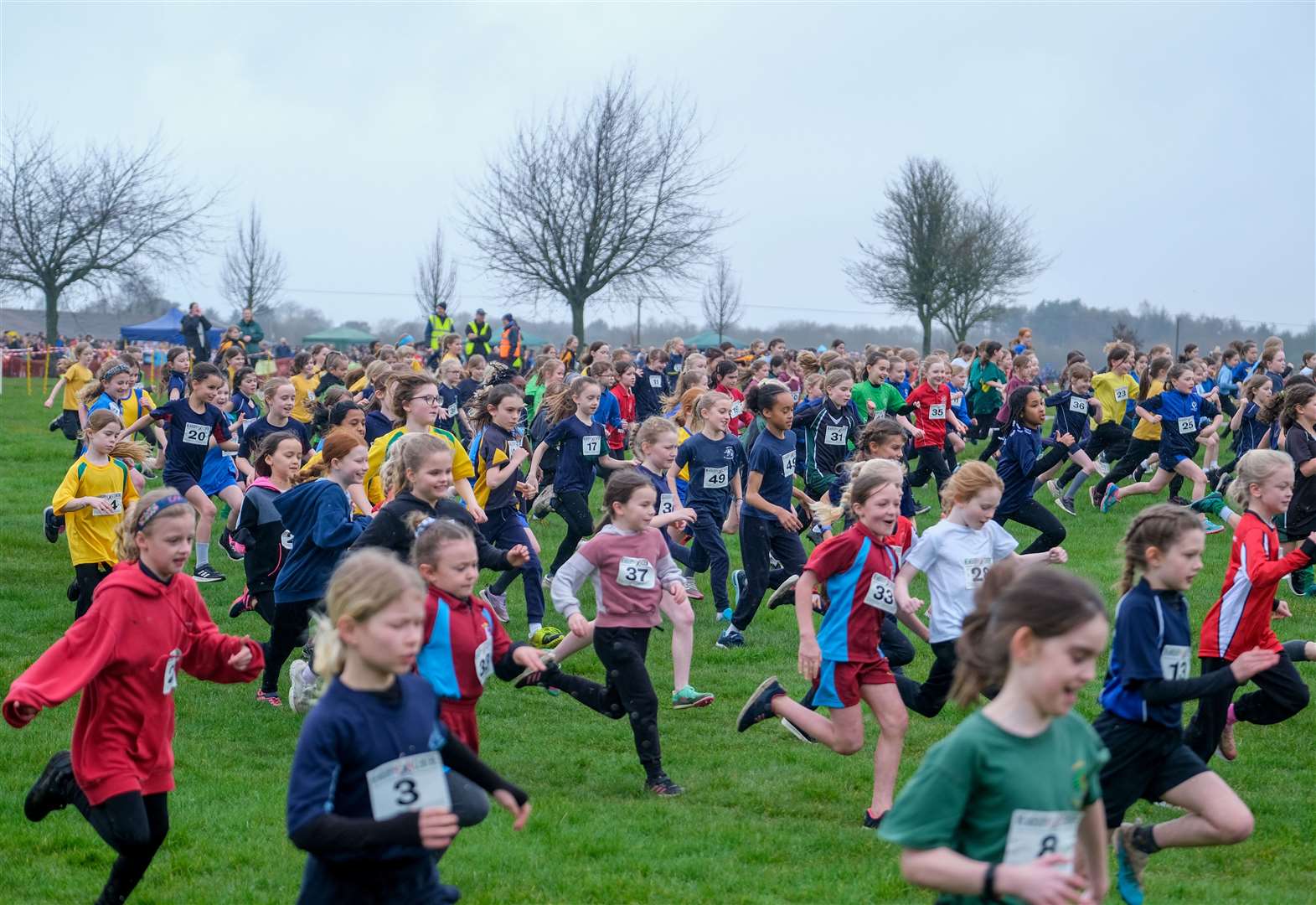 The Year 3/4 girls make a break at the start