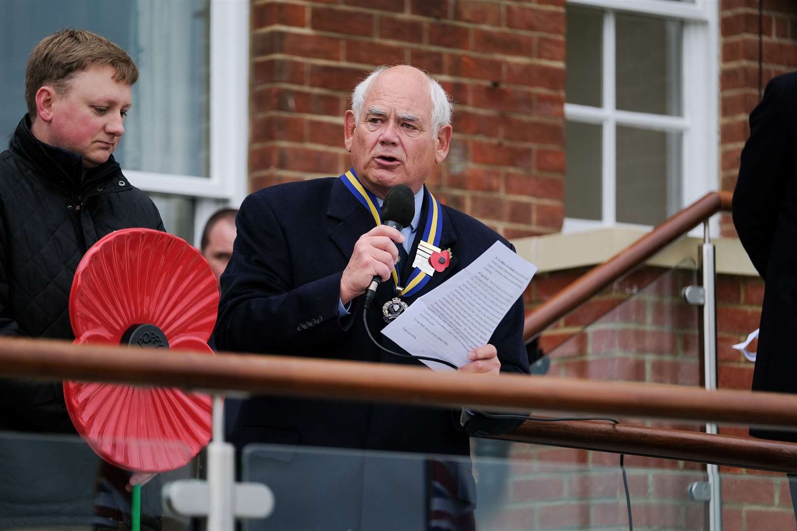 Group Captain David Drew, RBL county president, spoke at the short service