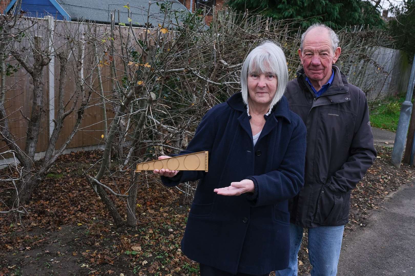 Frank and Mary Bird where their tree once stood.