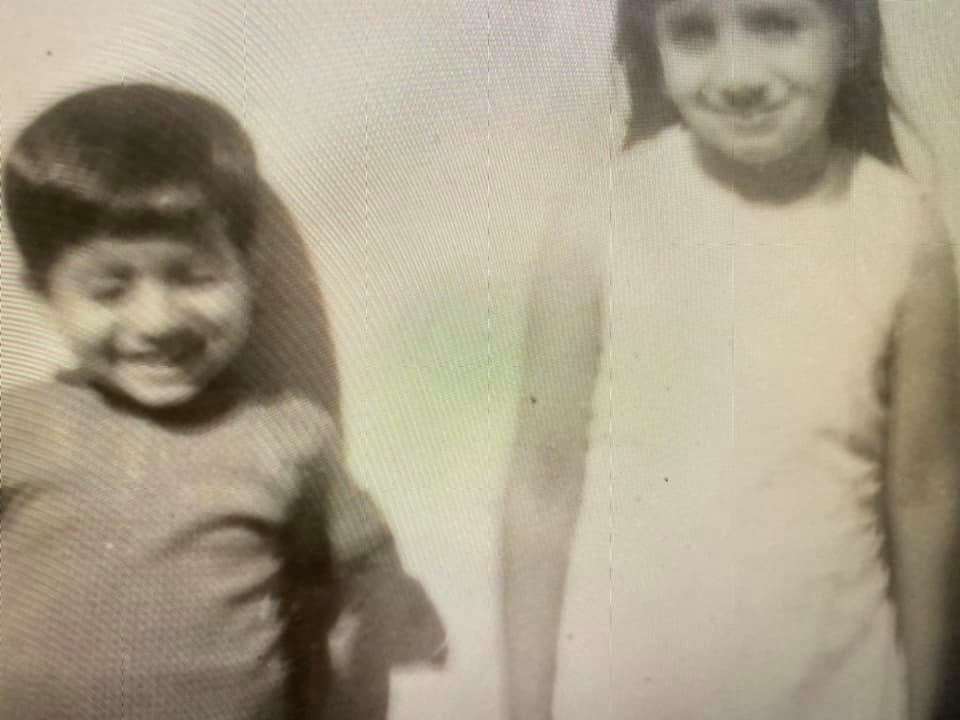 Pragna Hay in Uganda with her younger brother