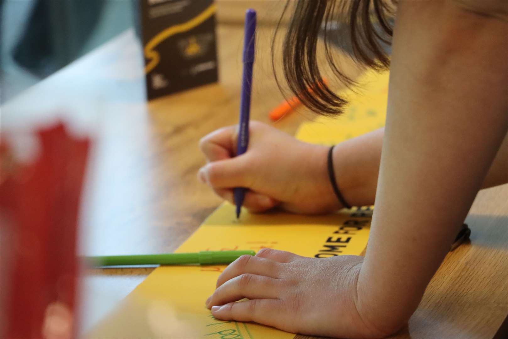Signing the yellow ribbons in support of our athletes
