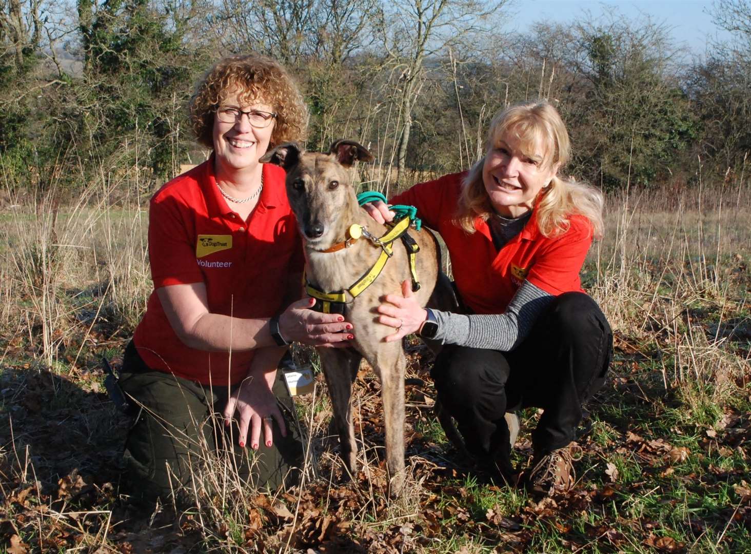 Hawk with volunteers, Catherine, left, and Catherine Lewis