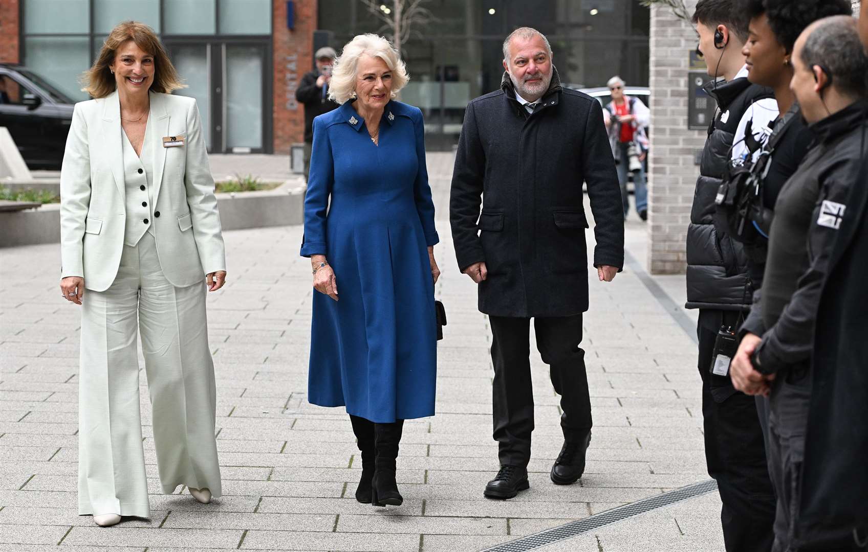 Camilla with Dame Carolyn McCall, chief executive of ITV, and executive producer Jed Mercurio during a visit to the set of Trigger Point (Eddie Mulholland/Daily Telegraph/PA)