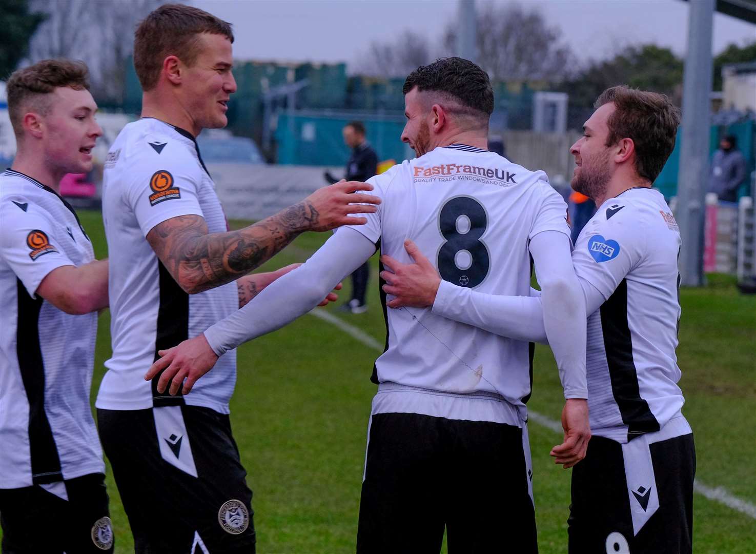 Matt Partridge celebrates with Jake Evans, Callum Willmoth and Ryan Seager