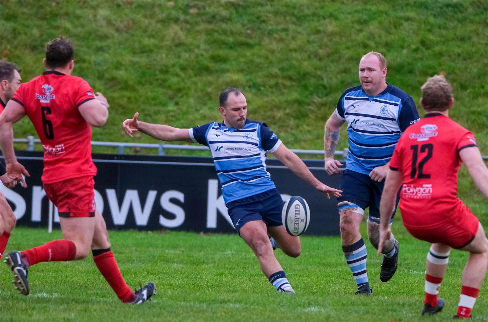 Captain Dan Thorne kicks under pressure
