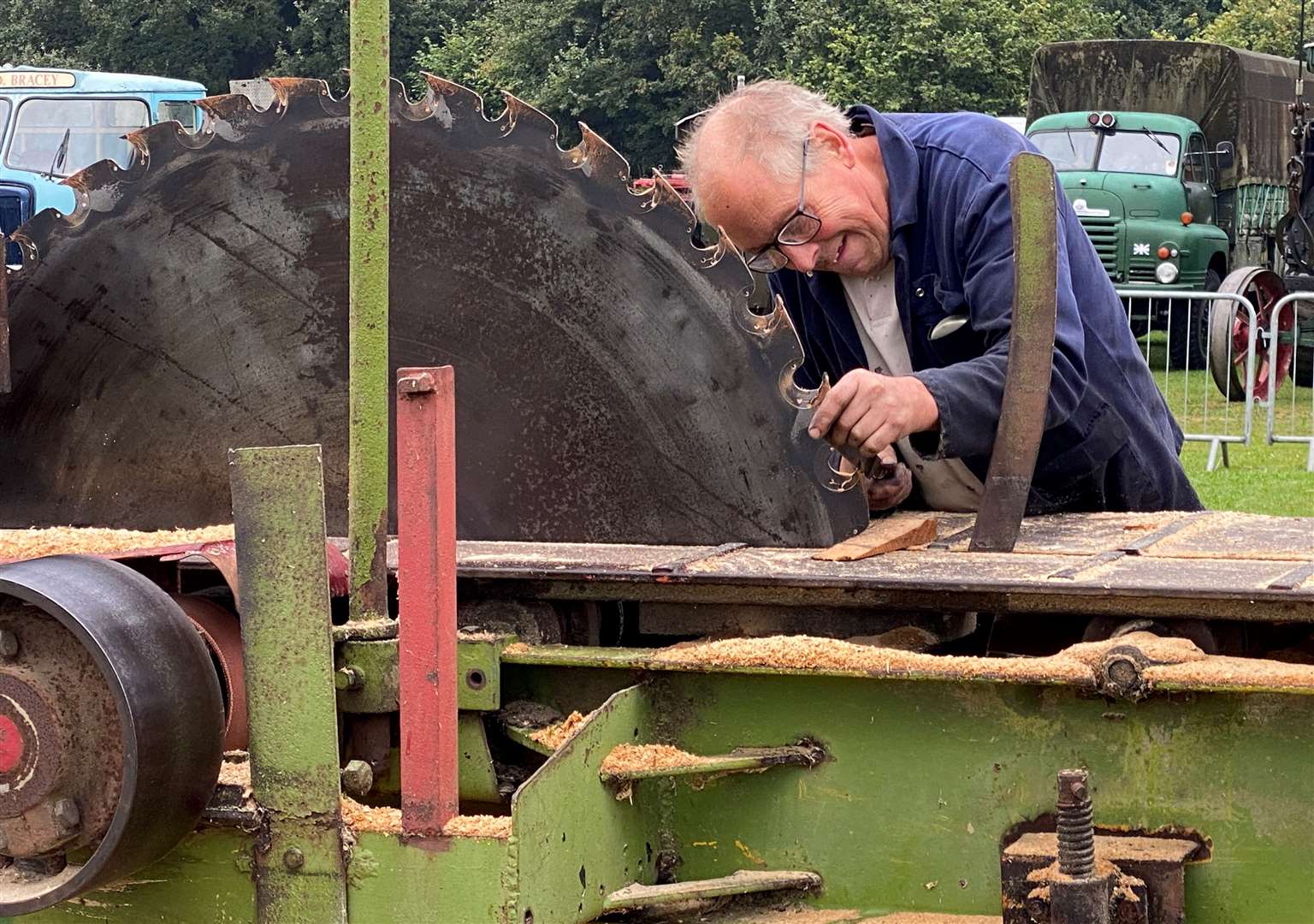 Fred Cooper sharpens the teeth of a Tasker Rack Saw at the Newbury Show, one of many exhibits of vintage farming machinery