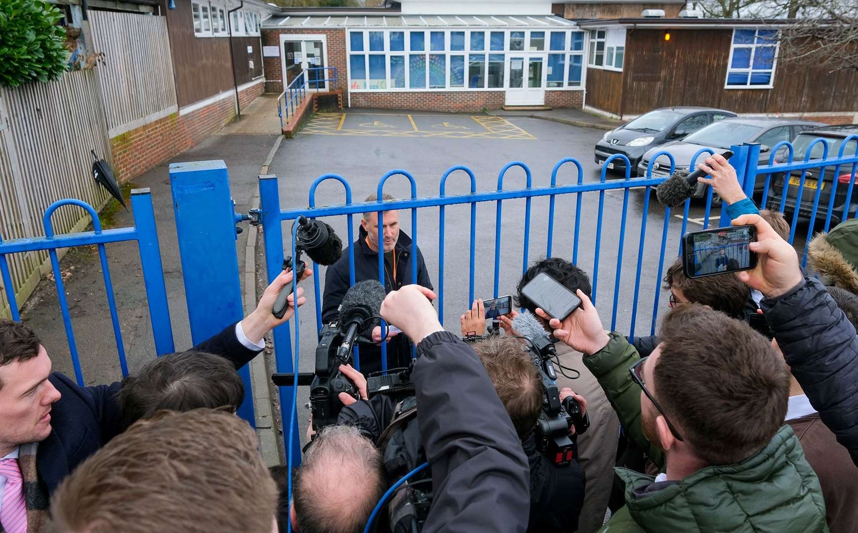 Media outside John Rankin Schools in March 2023