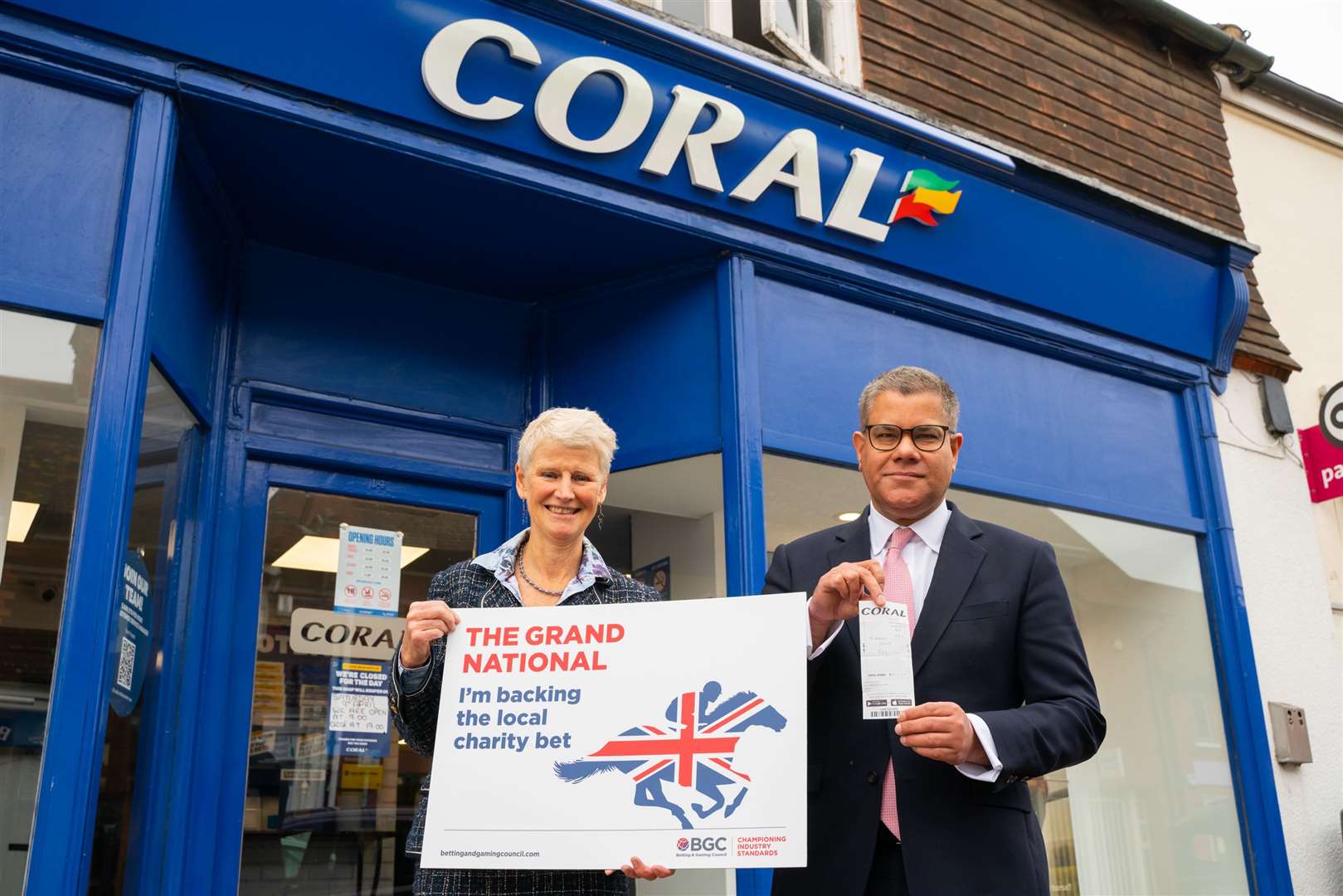 Mr Sharma outside Coral in Theale with BGC's chair Brigid Simmonds (57345955)