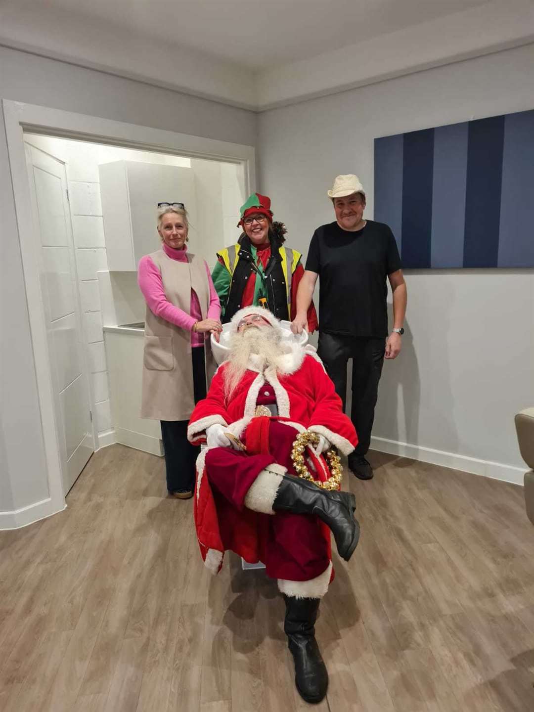 Santa Claus opened the new Wellbeing/Treatment room at Bishops Green Village Hall