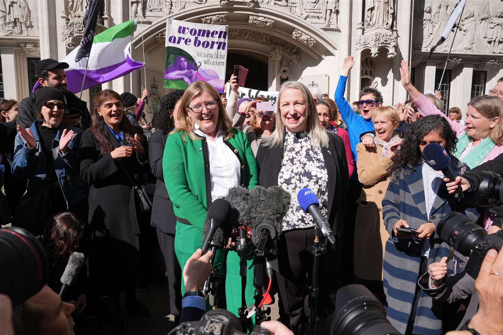 Susan Smith and Marion Calder, co-directors of For Women Scotland , celebrate outside the Supreme Court in London (Lucy North/PA)