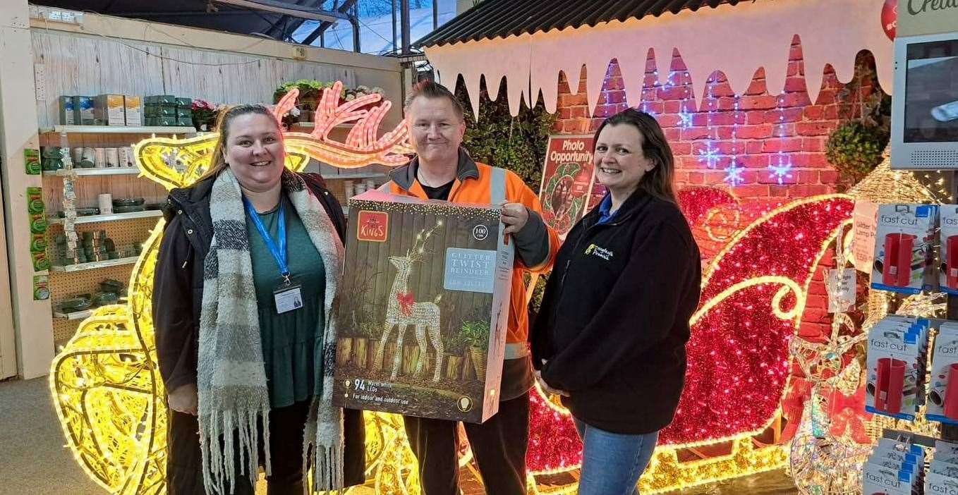 Zoe Cox and Kym Elliott from Dingley's Promise receiving their light-up Christmas reindeer