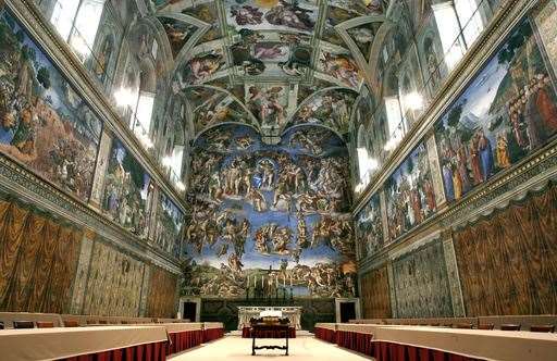 Tables and chairs line the Sistine Chapel at the Vatican in preparation for a conclave in 2005 (Pier Paolo Cito/AP)