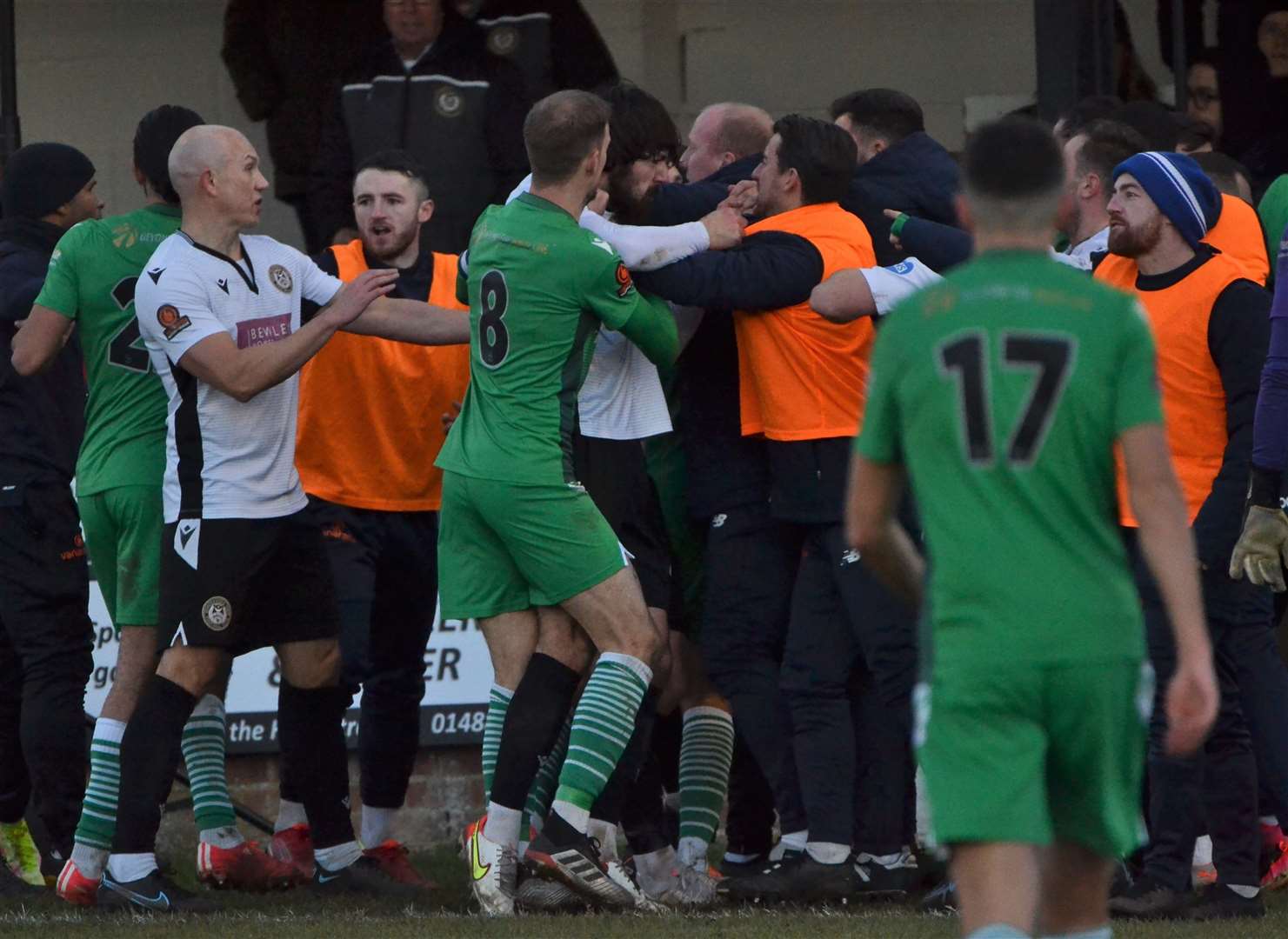 Players from both sides get involved in a tussle