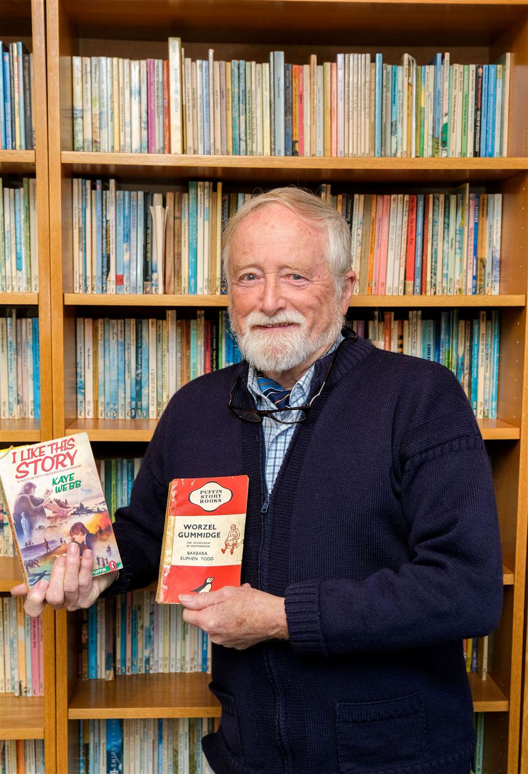 Paul High with the first and 2,000th Puffin story book