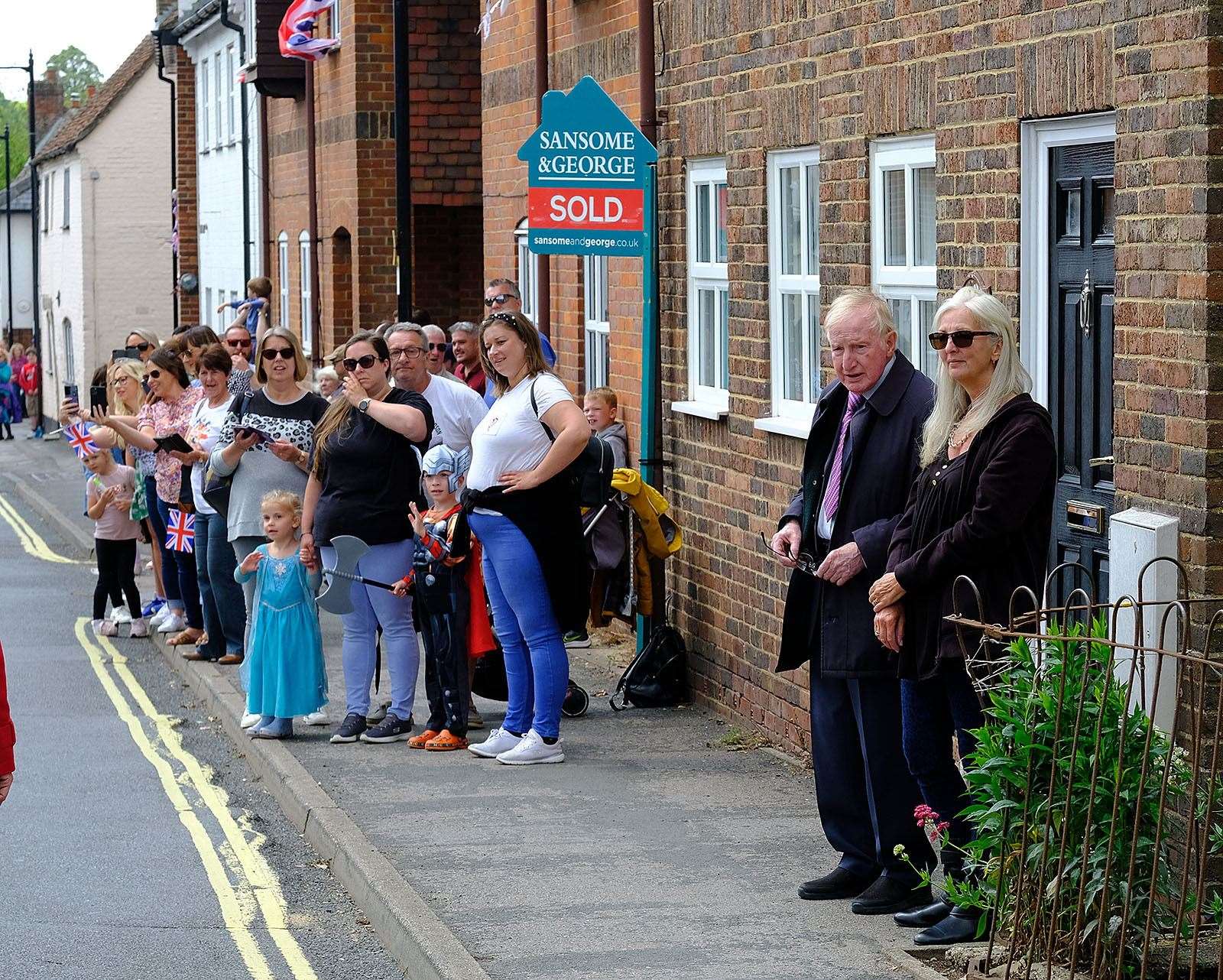 Residents lined the streets