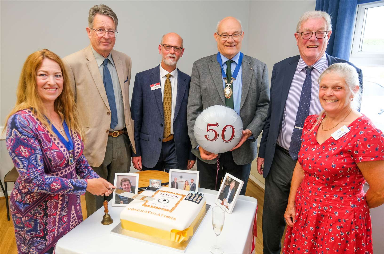 Deputy Mayor of Thatcham, Petra Pemberton, cuts the cake with Kimbal Earl, Stephen Coke, Chairman of Thatcham Chamber of Commerce Jeremy Cottam, Heslops Founder Colin Heslop and Thatcham Rotary Club President, Audrey Kelly