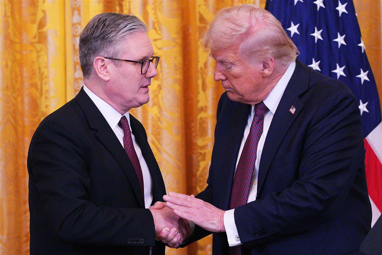 US President Donald Trump and Prime Minister Sir Keir Starmer hold a joint press conference in the East Room at the White House in February (Carl Court/PA)