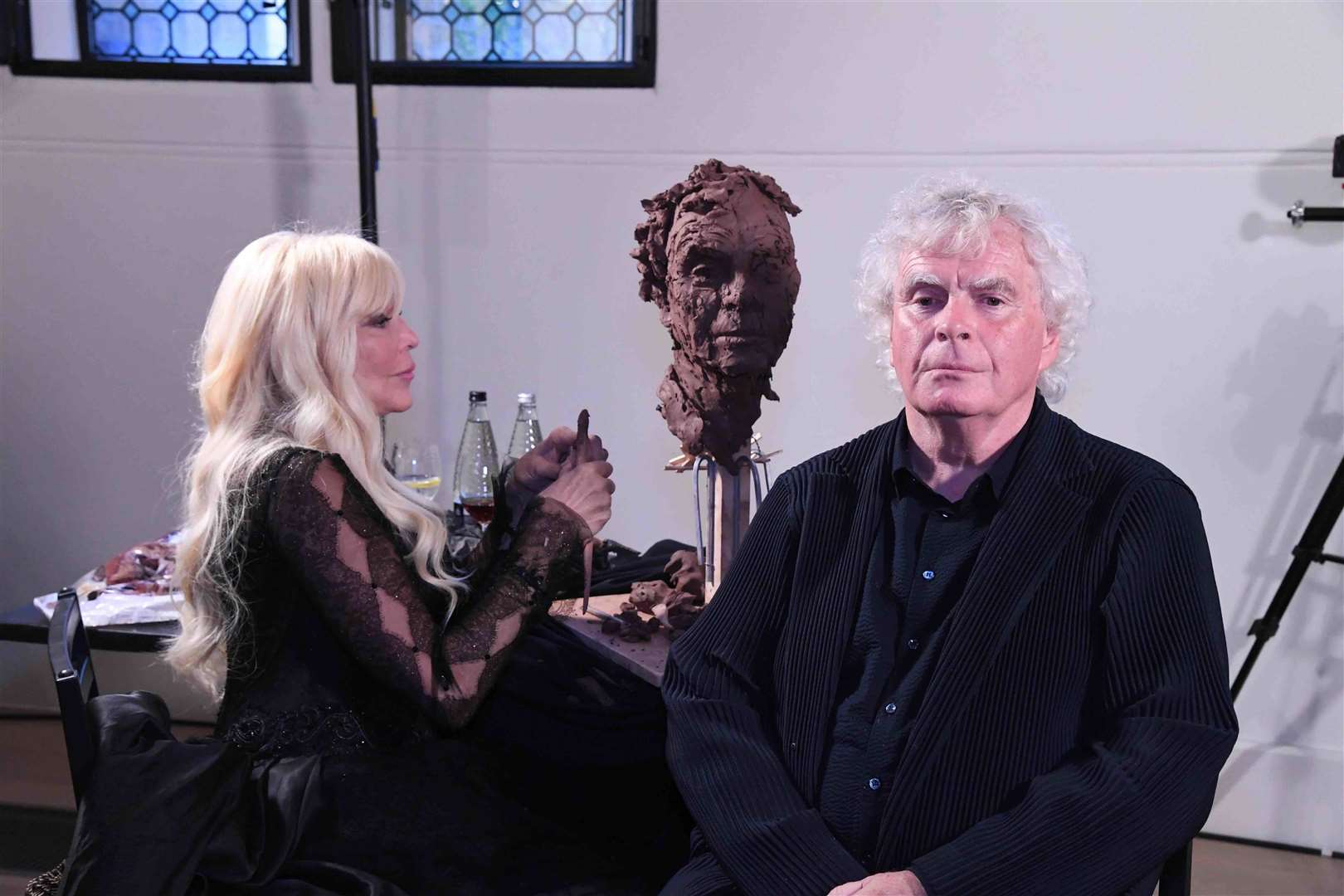 Francis Segelman sculpting Sir Simon Rattle