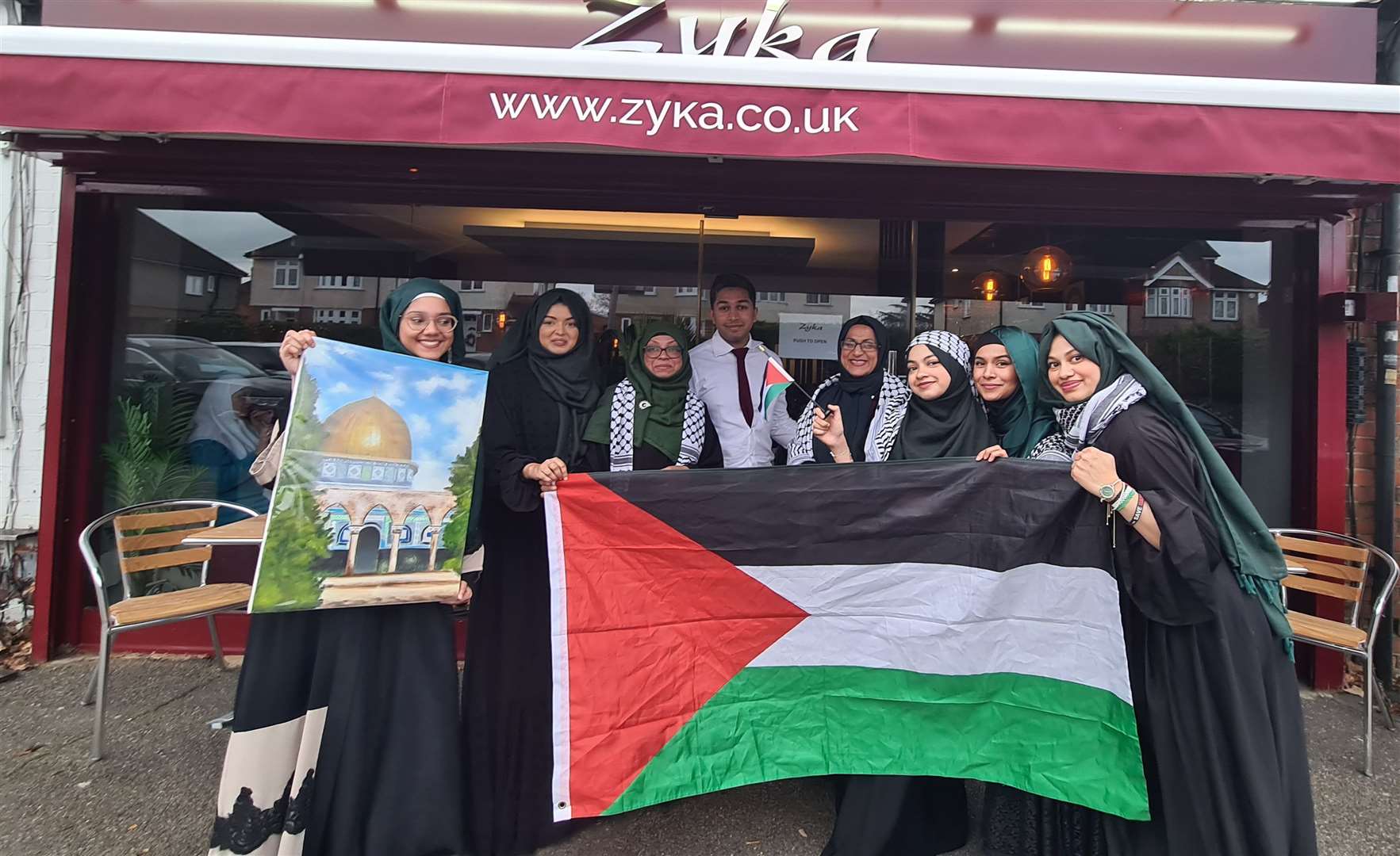 Zyka owner Zaky Khan with the charity organisers