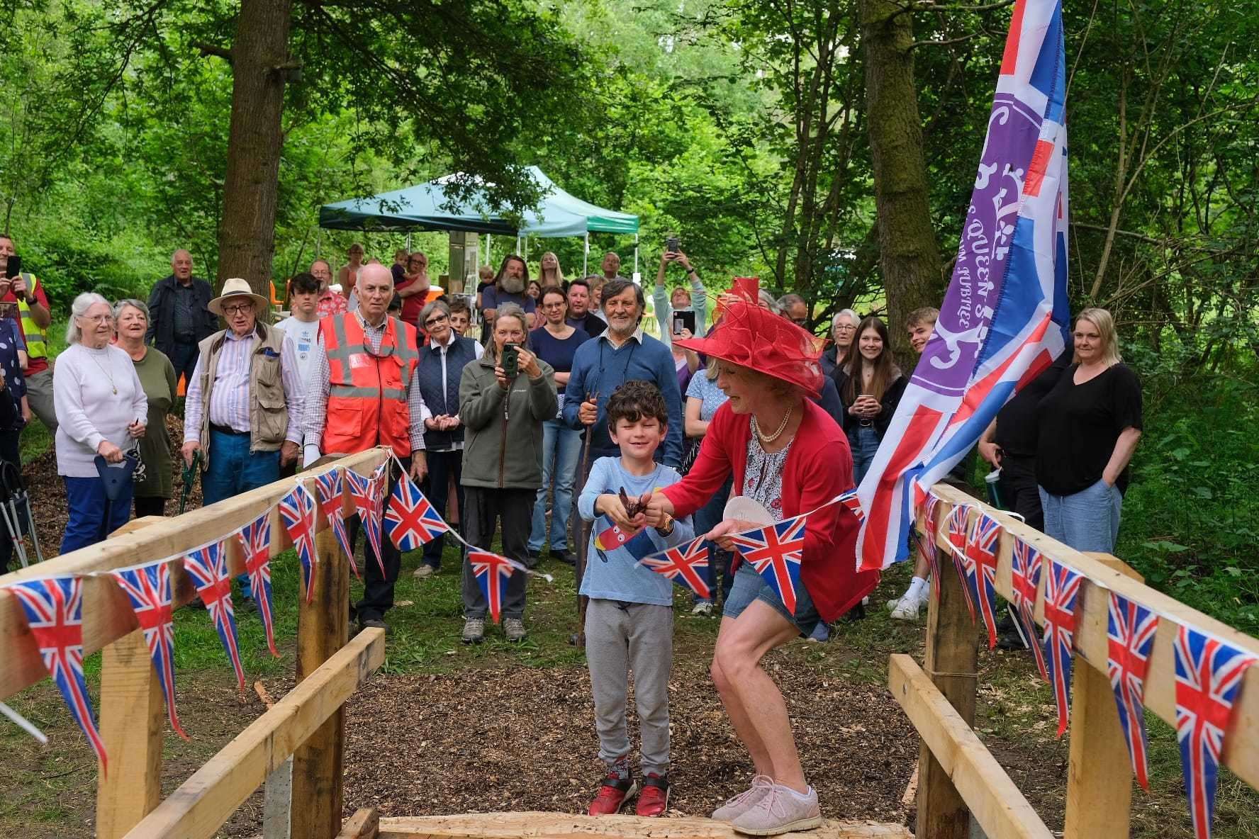 Beenham Jubilee bridge opened by Pat Owen and Felix Roe in Greyfield woods