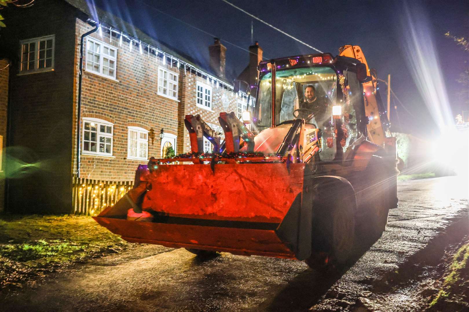 Woolton Hill Christmas Tractor Run coming along Tubbs Lane in Highclere